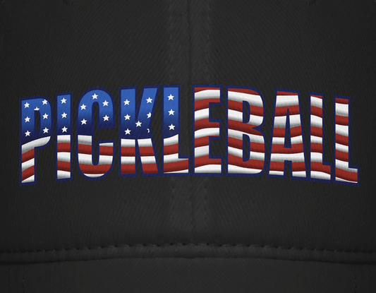 "Pickleball text with American flag design on black background"