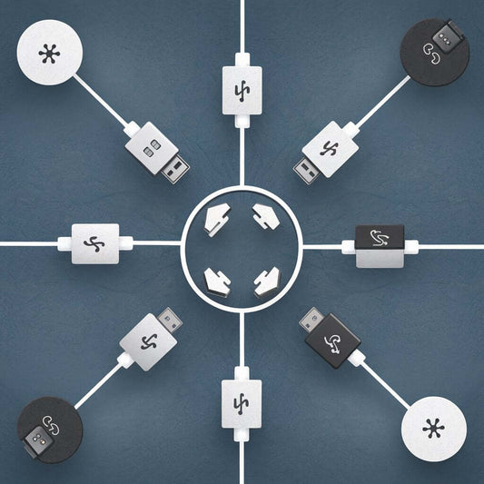 Various USB-C connectors and cables arranged in a circular pattern on a textured blue background.
