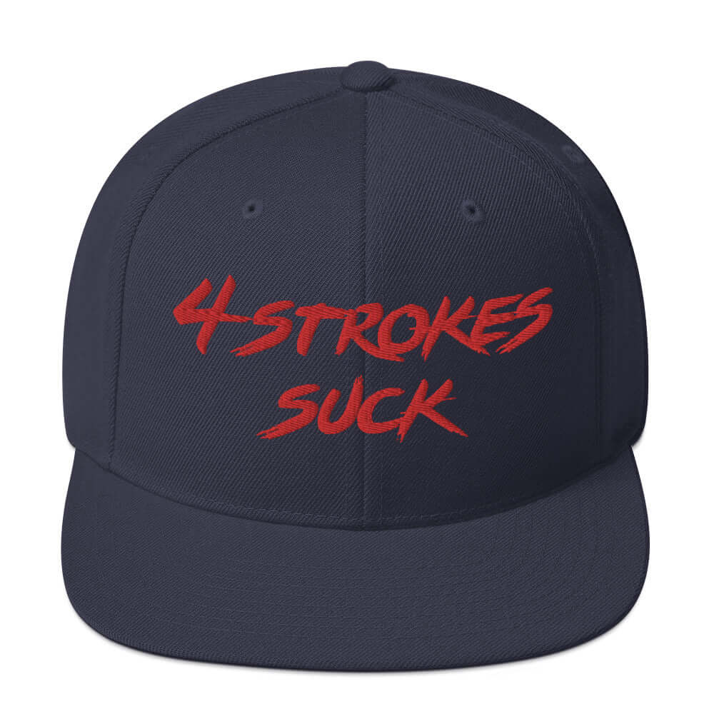 "4-Strokes Suck Embroidered Snapback Hat in navy, celebrating motocross culture with bold red lettering"