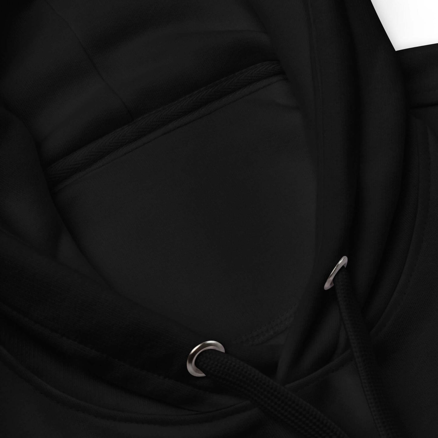 Close-up of black Adult Premium Eco Hoodie – Camping Edition showcasing cozy fleece interior and stylish design.