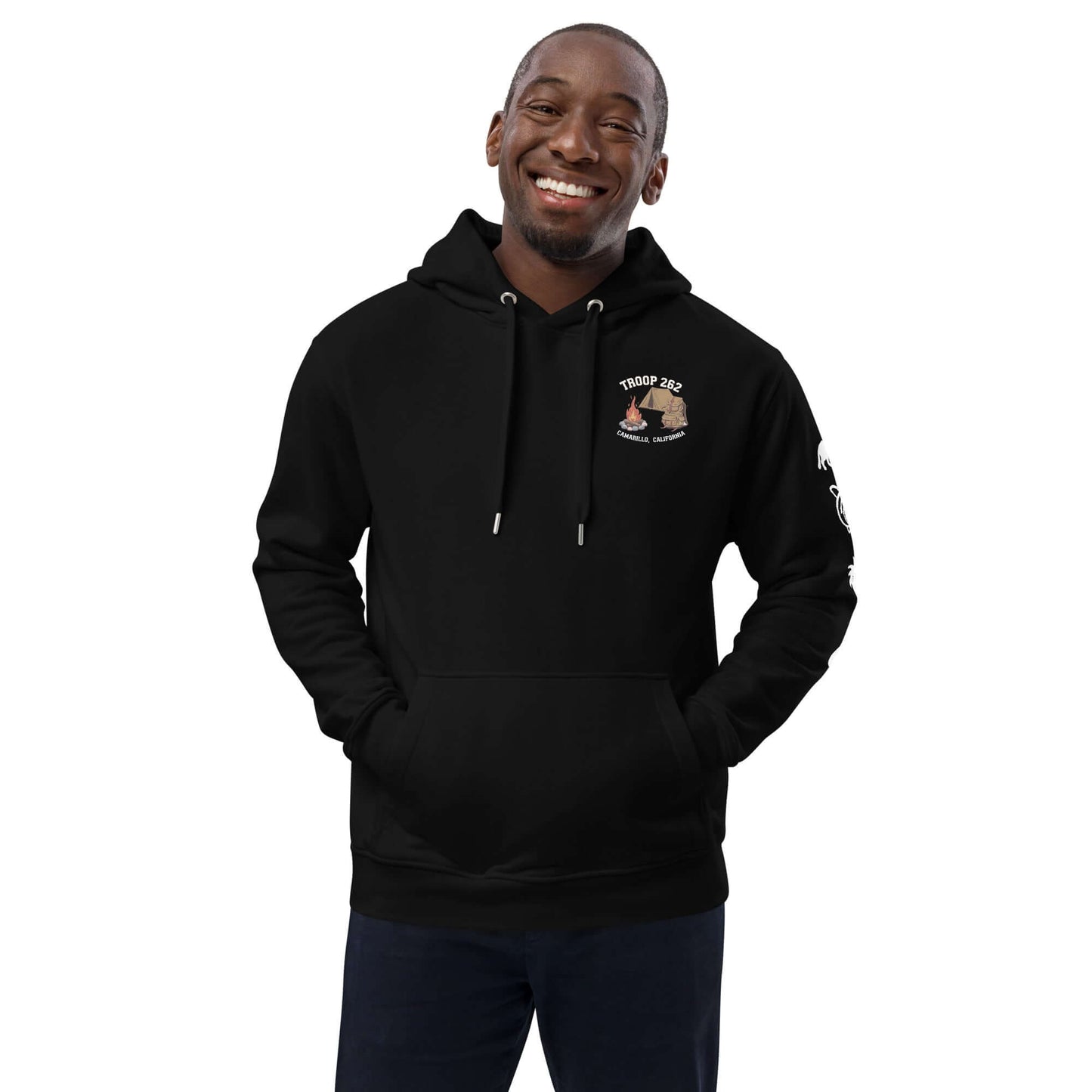 Man smiling in a black Adult Premium Eco Hoodie – Camping Edition, promoting eco-friendly fashion.