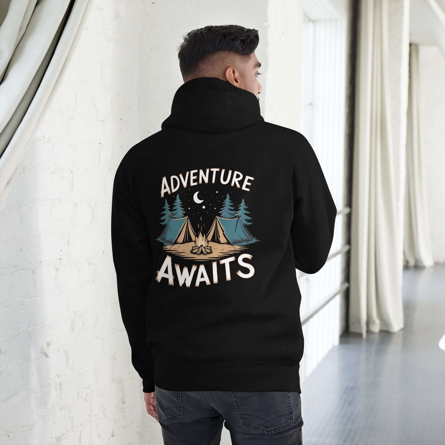 Adult unisex hoodie with 'Adventure Awaits' graphic, perfect for outdoor activities and casual wear.