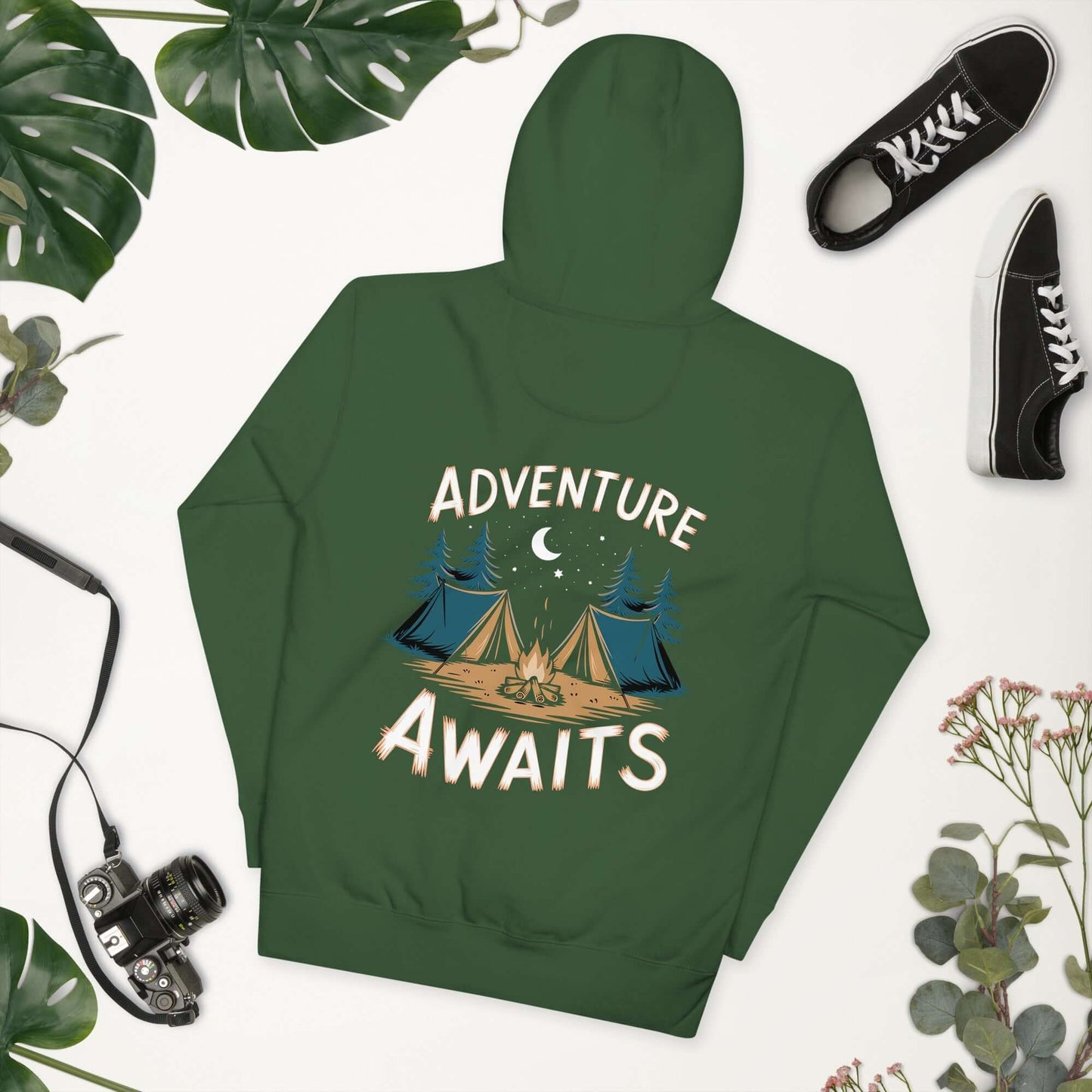 Adult unisex hoodie in green with 'Adventure Awaits' design, featuring camping tents and a moon.