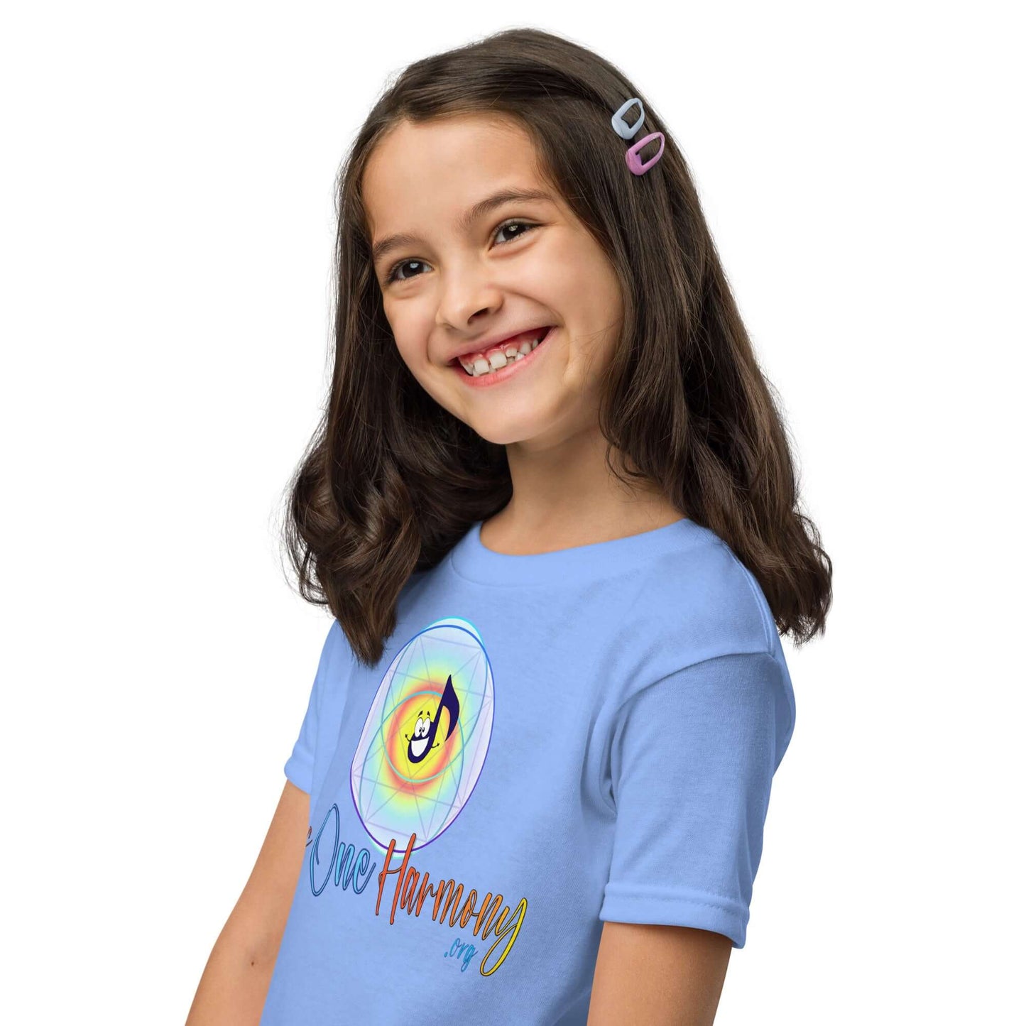Smiling girl in a blue moisture-wicking t-shirt featuring the phrase 'Once Harmony' for active kids.