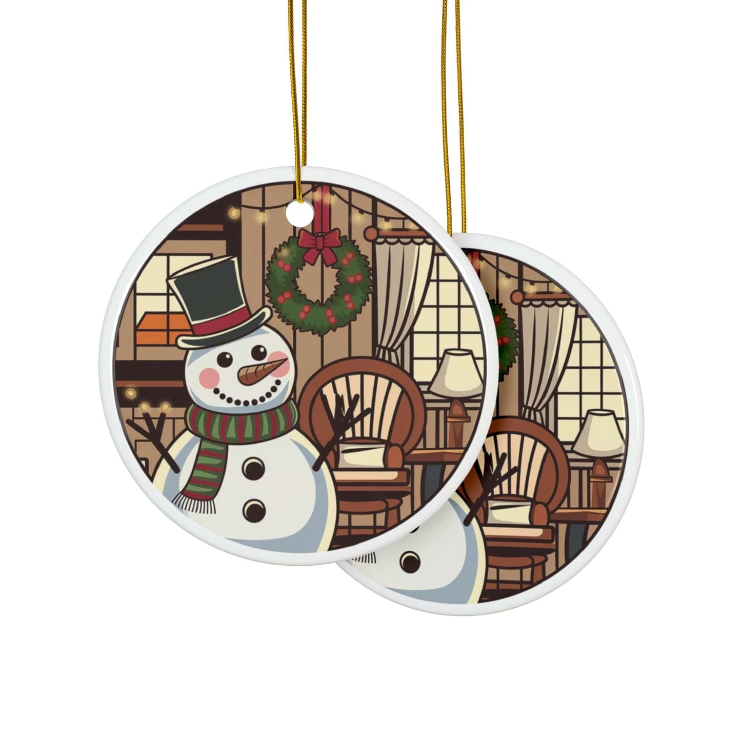 Two-sided ceramic ornaments with a jolly snowman, top hat, scarf, and a cozy room backdrop featuring a wreath and rustic chairs.