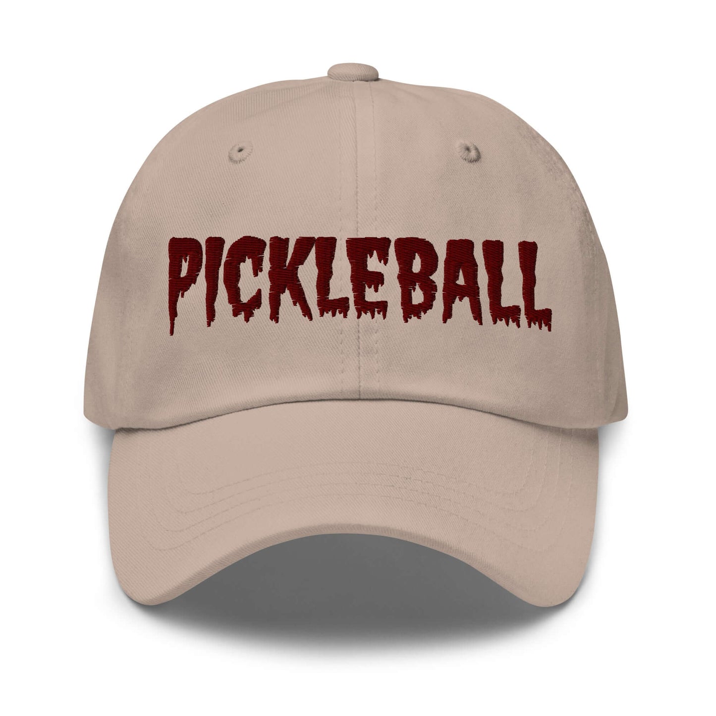 Haunted pickleball spirit hat with spooky maroon embroidery on beige cotton twill, perfect for adding eerie style to your game.