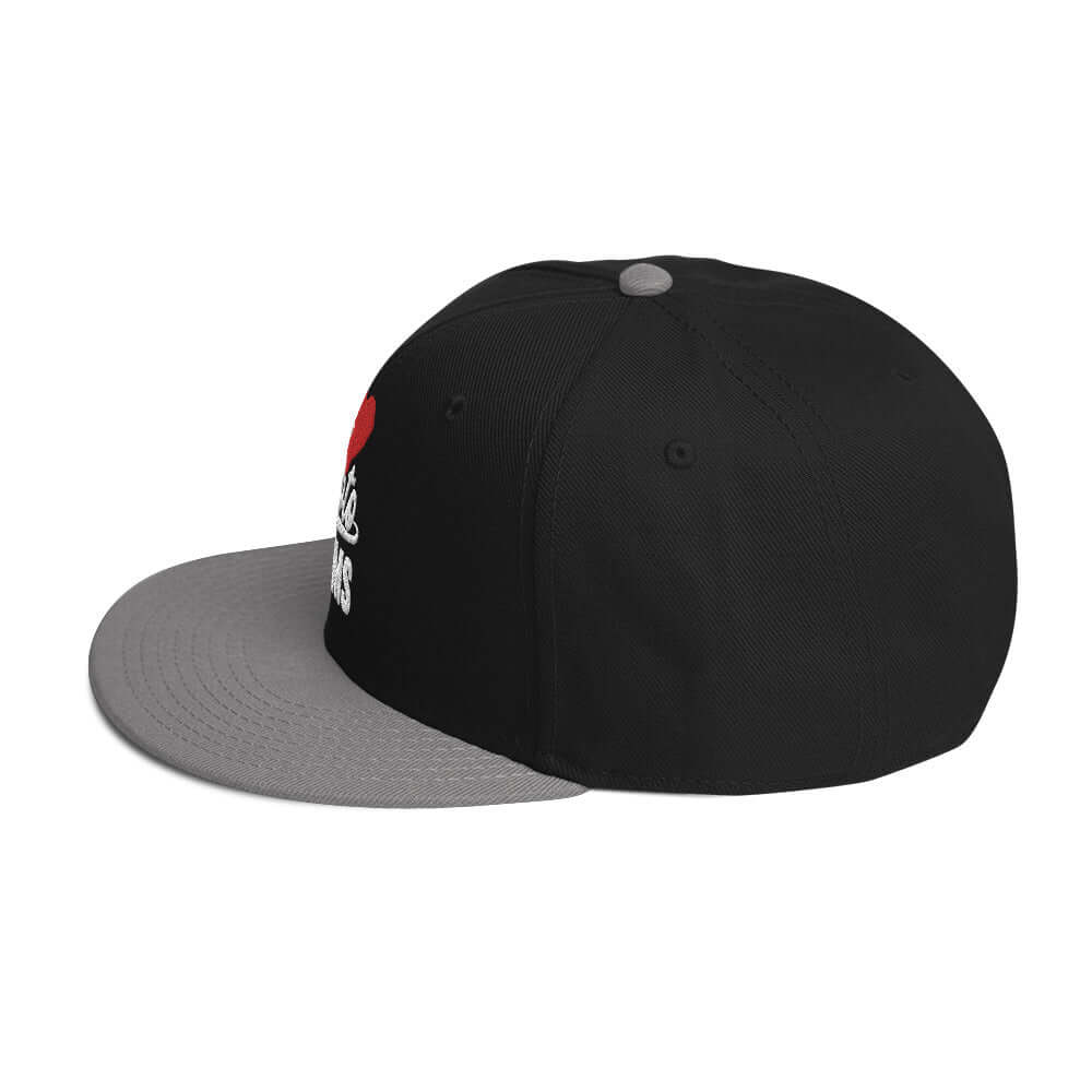 left side of Ronnie Mac 69's I Heart Moto Mom's Embroidered Snapback Hat (gray/Black)