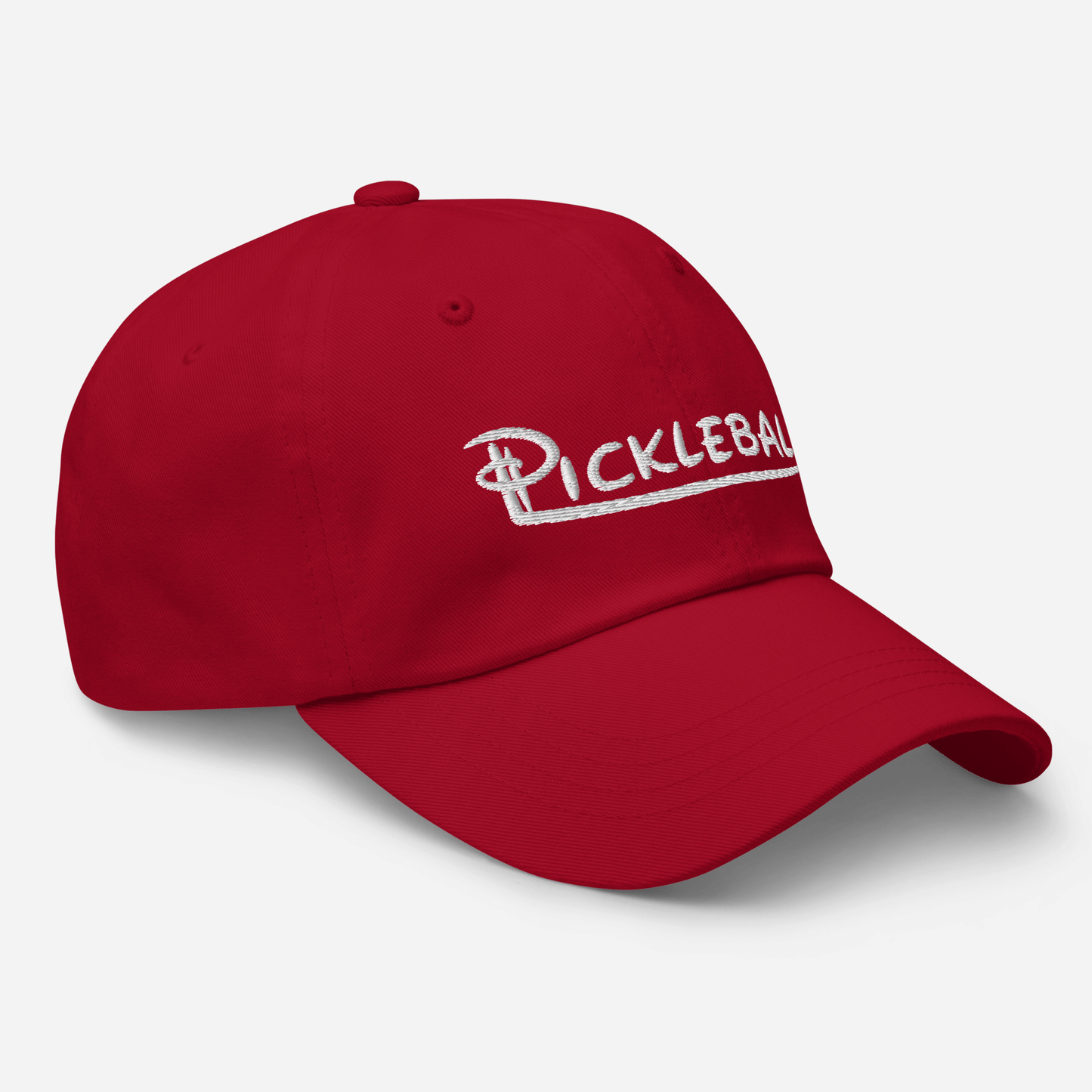 Red adjustable pickleball hat with embroidered text and curved visor.