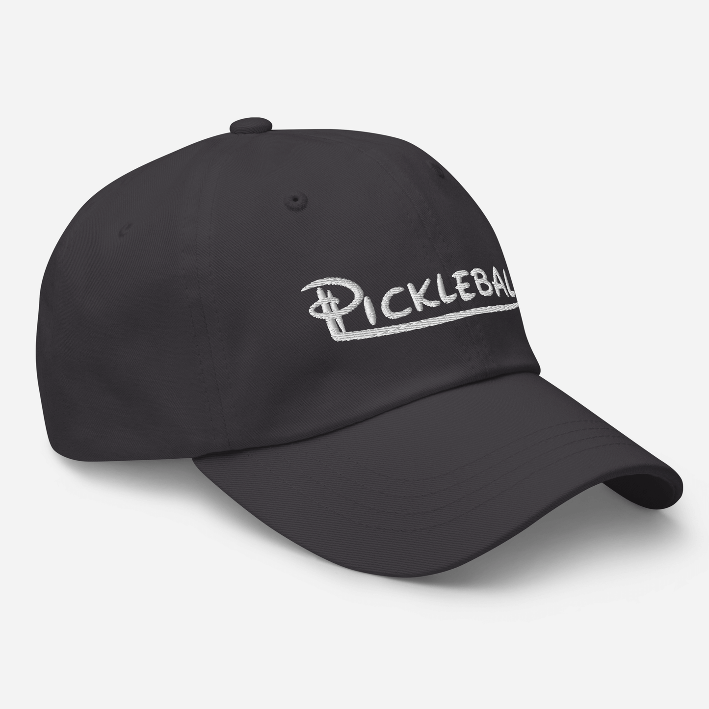 Low profile pickleball hat with adjustable strap and embroidered design on black fabric.