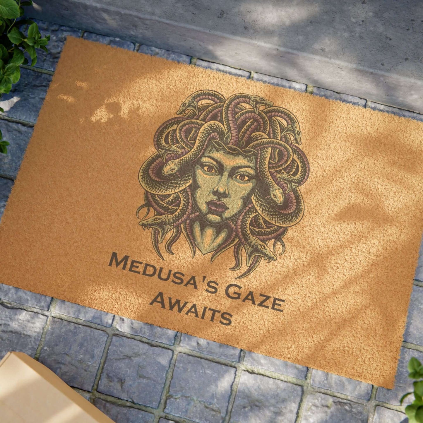 Spooky Medusa Halloween doormat with eerie design on stone path.