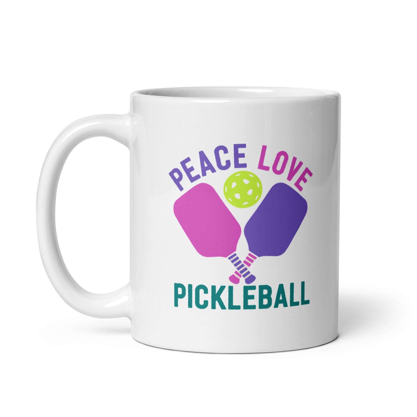 White glossy mug featuring 'Peace Love Pickleball' graphic with pickleball paddles and ball design.