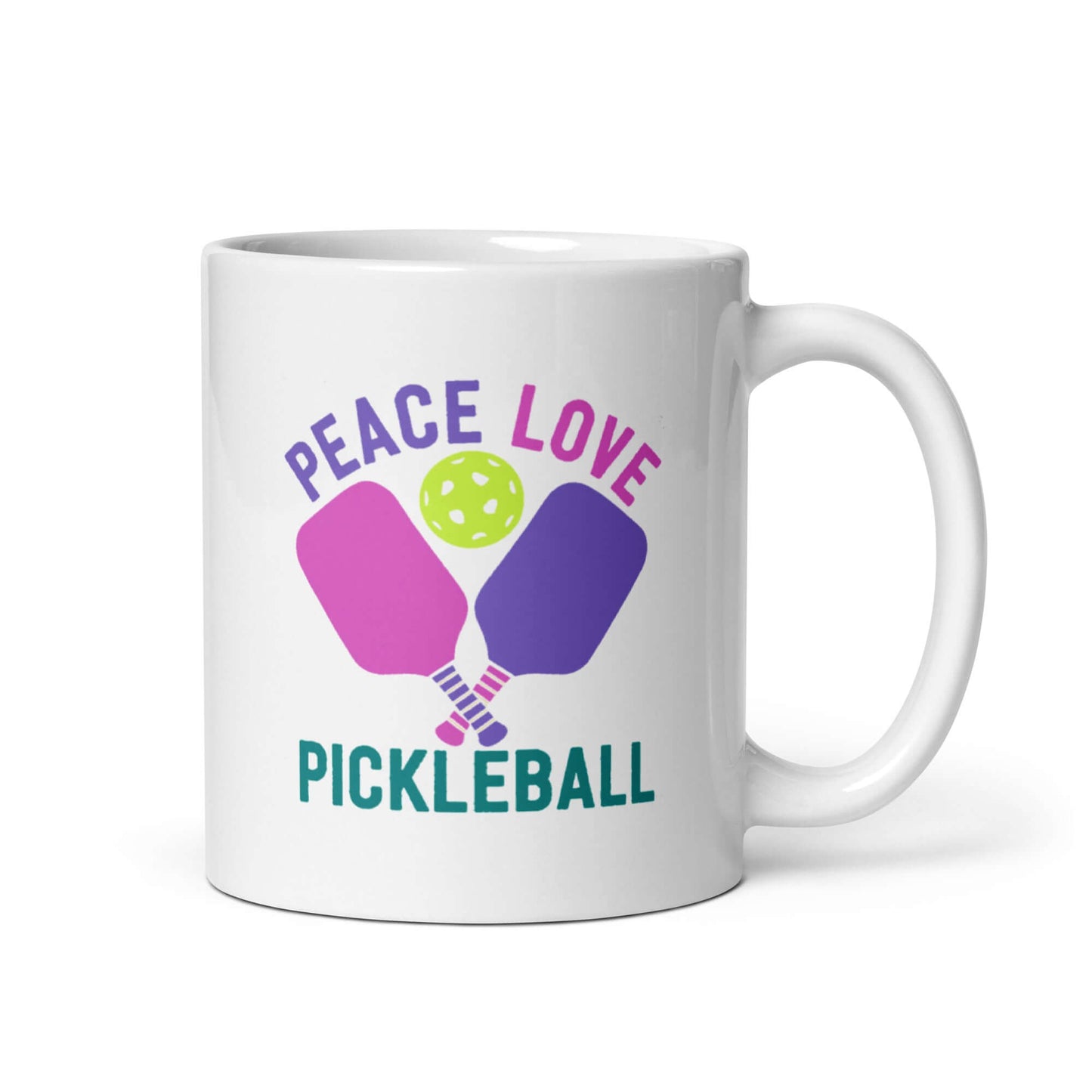 White glossy mug featuring 'Peace Love Pickleball' with paddles and a pickleball design.