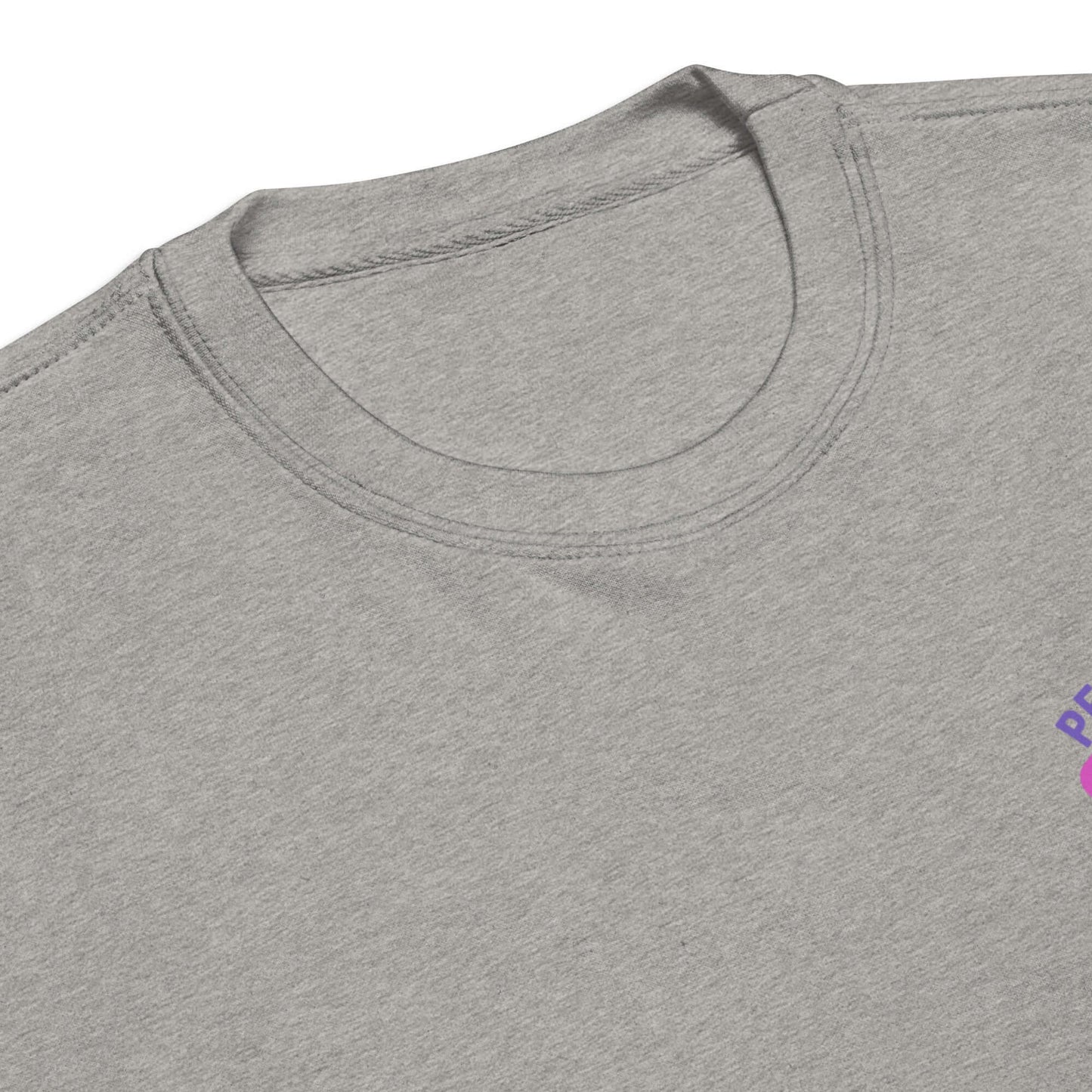 Close-up view of the neckline of a gray women's sweatshirt featuring peaceful pickleball graphics.