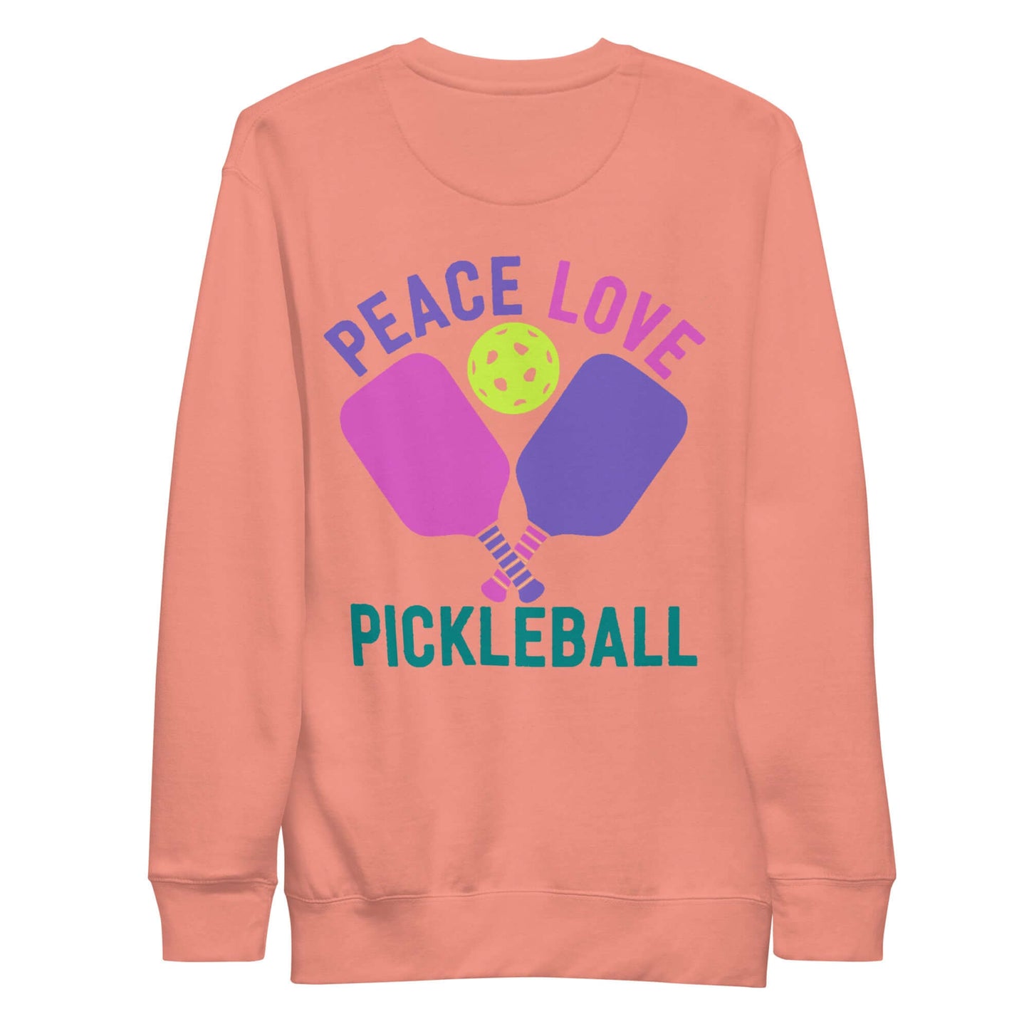 Women's peach sweatshirt featuring 'Peace Love Pickleball' graphic, perfect for pickleball enthusiasts.