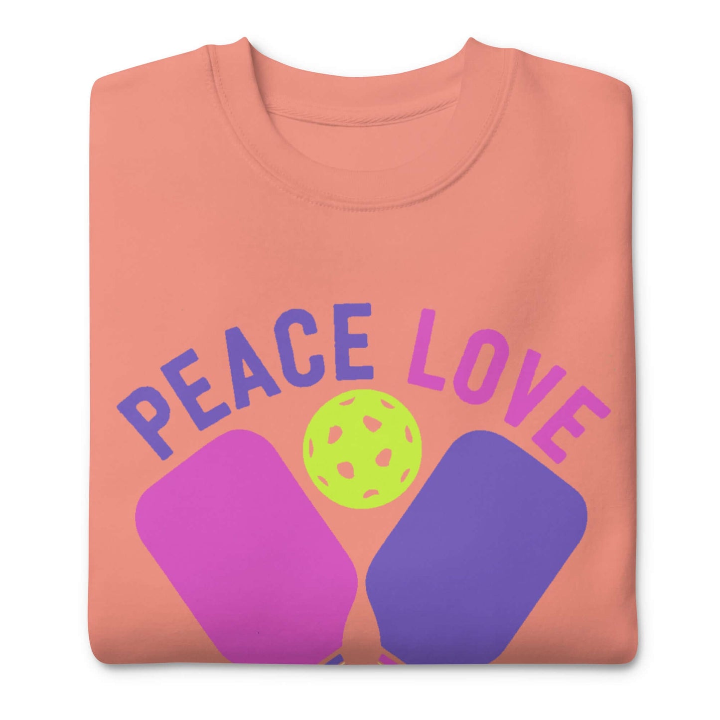 Women's Peace Love Pickleball Premium Sweatshirt in coral color featuring pickleball graphic.