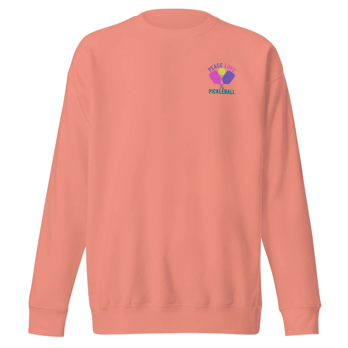 Women's peach sweatshirt with 'Peace Love Pickleball' graphic for stylish pickleball enthusiasts.