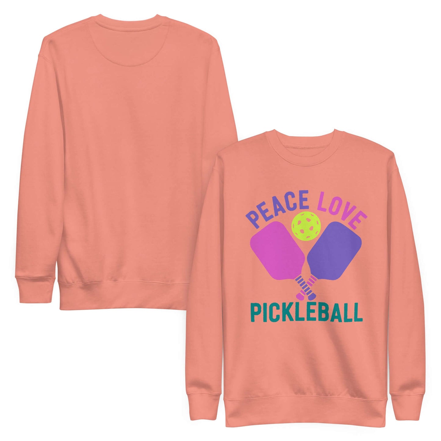 Women’s peach sweatshirt featuring 'Peace Love Pickleball' design and pickleball paddles, perfect for casual wear.