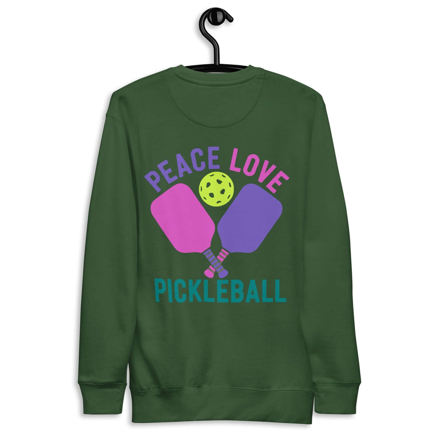 Green women's sweatshirt featuring "Peace Love Pickleball" with colorful paddles and a pickleball, trendy and cozy.