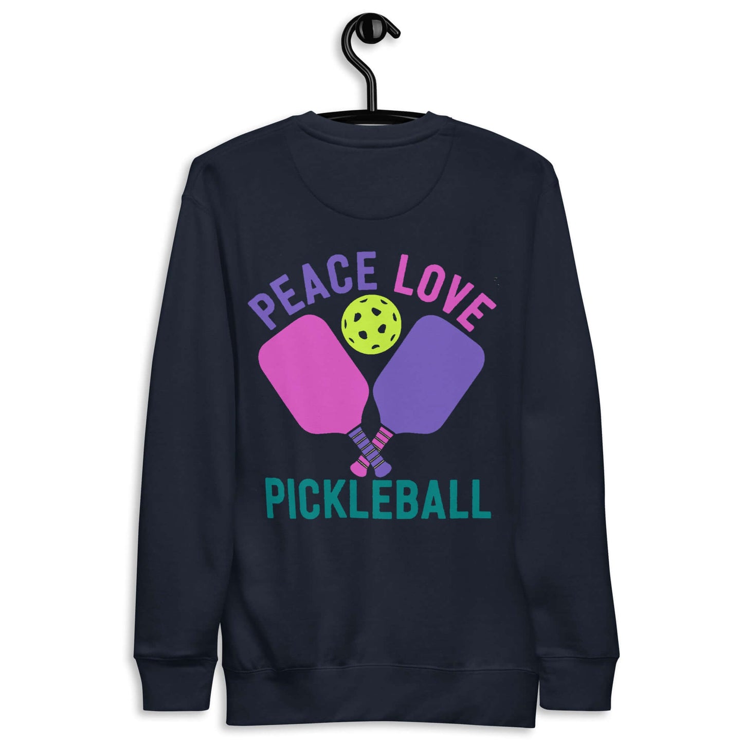 Women's navy sweatshirt featuring 'Peace Love Pickleball' graphic and colorful paddles design.