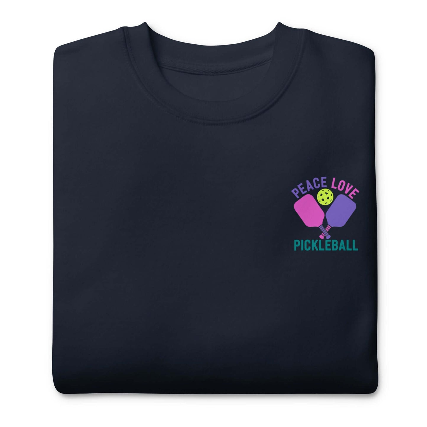 Women's Peace Love Pickleball Premium Sweatshirt featuring colorful graphics on a dark background