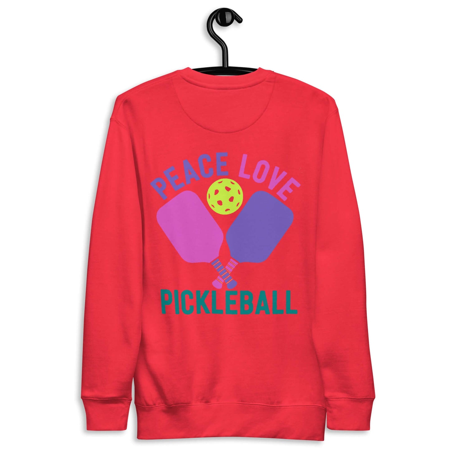 Red sweatshirt with 'Peace Love Pickleball' graphic, featuring pickleball paddles and ball, perfect for pickleball lovers.