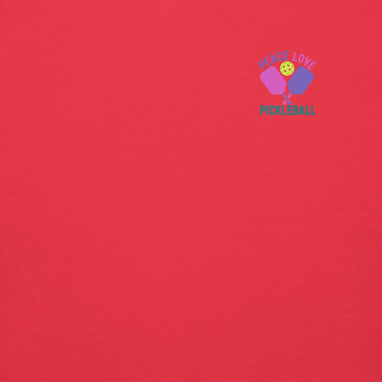 Women's red sweatshirt featuring 'Peace Love Pickleball' graphic in vibrant colors.
