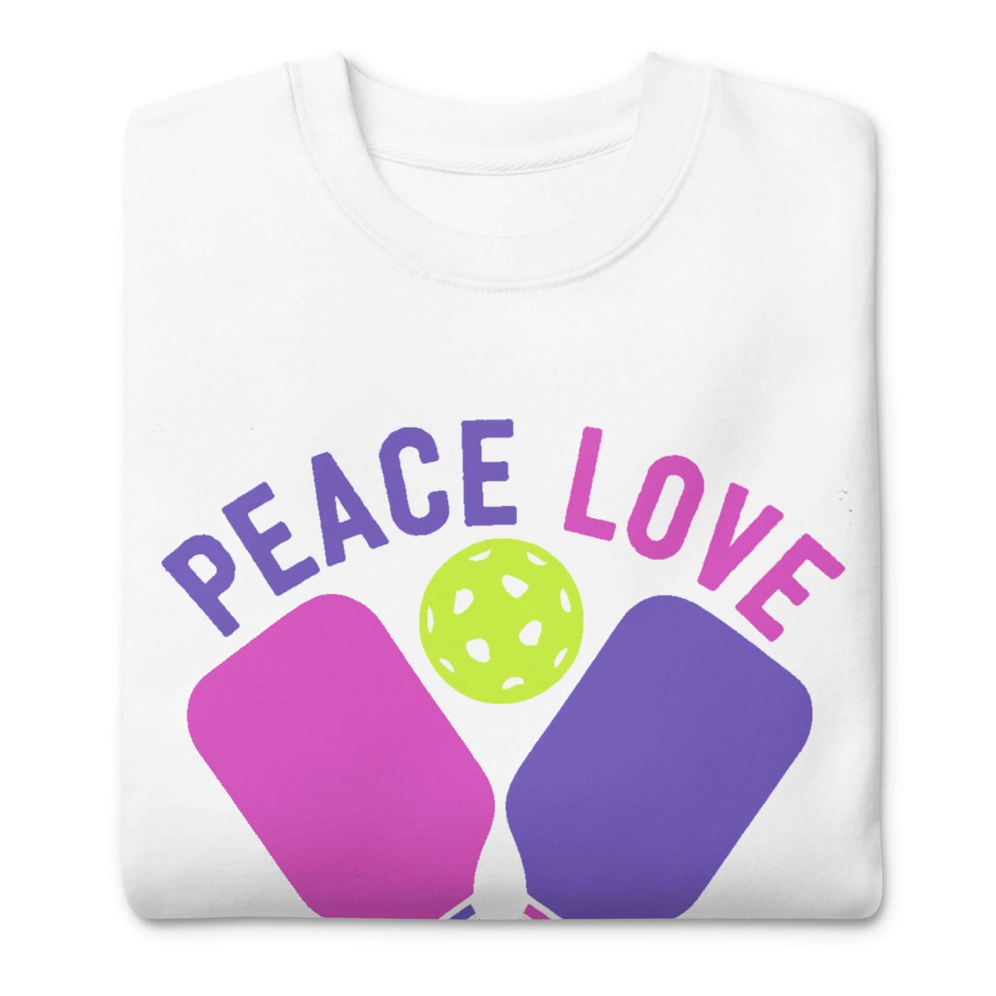 White sweatshirt with colorful 'Peace Love' pickleball graphic and paddles design for women.
