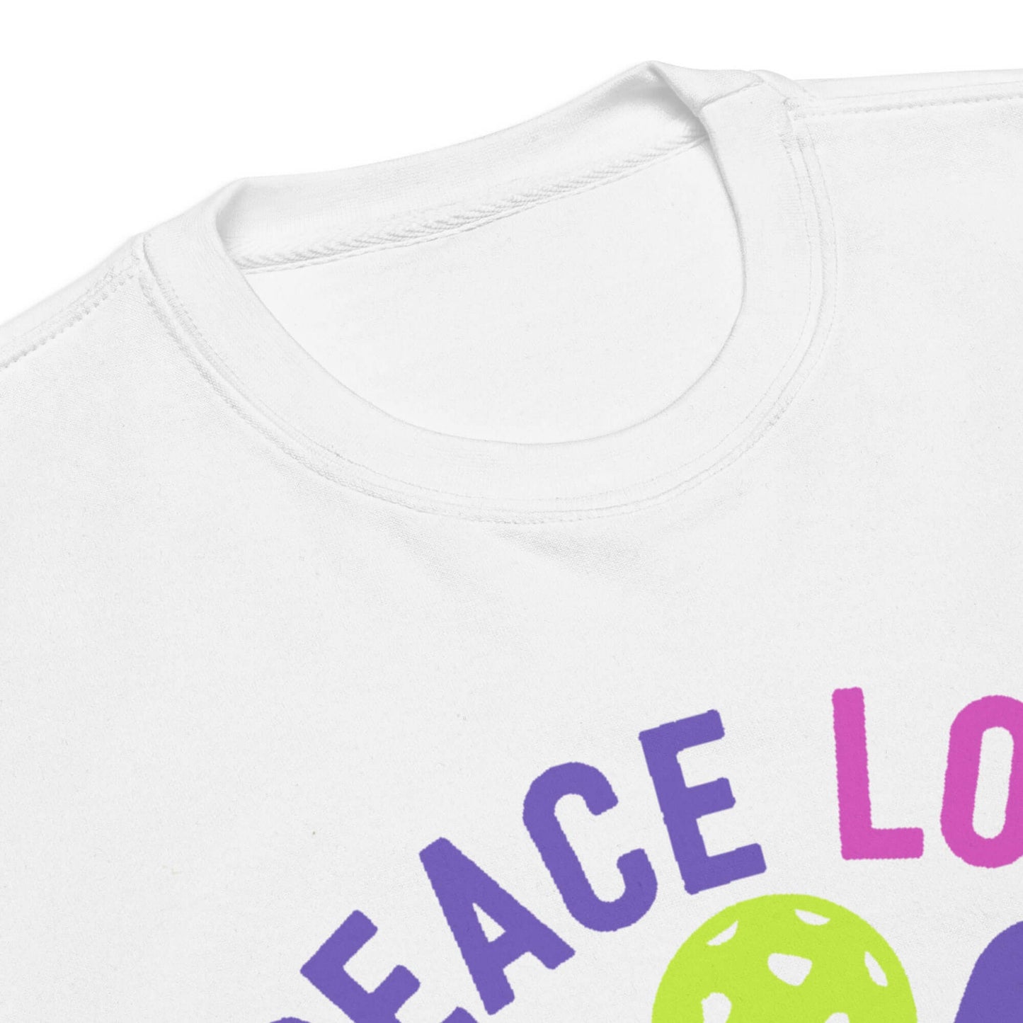 Close-up of Women's Premium Sweatshirt neckline featuring colorful 'Peace, Love, Pickleball' design.