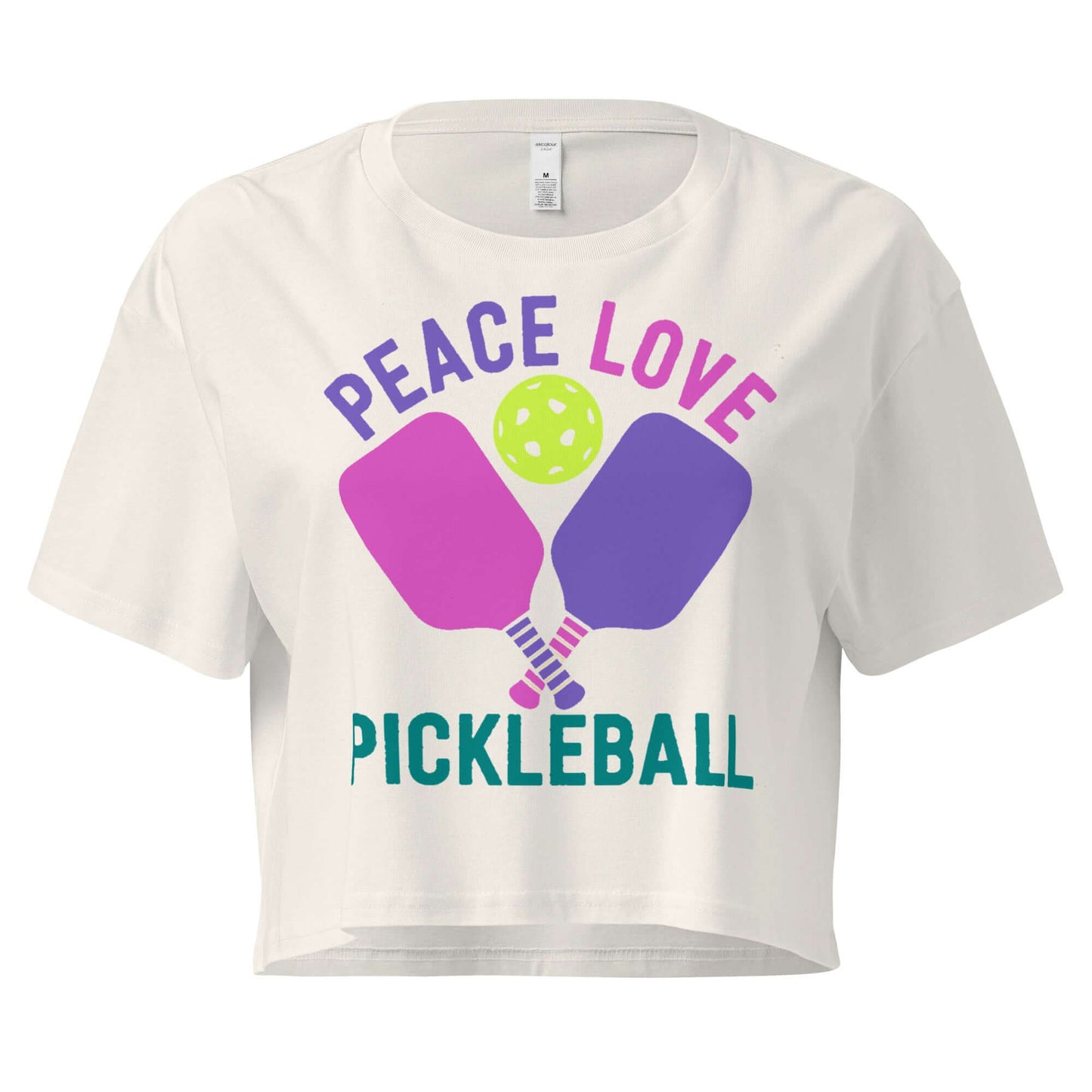 Women's crop top with 'Peace Love Pickleball' graphic, perfect for stylish pickleball enthusiasts.