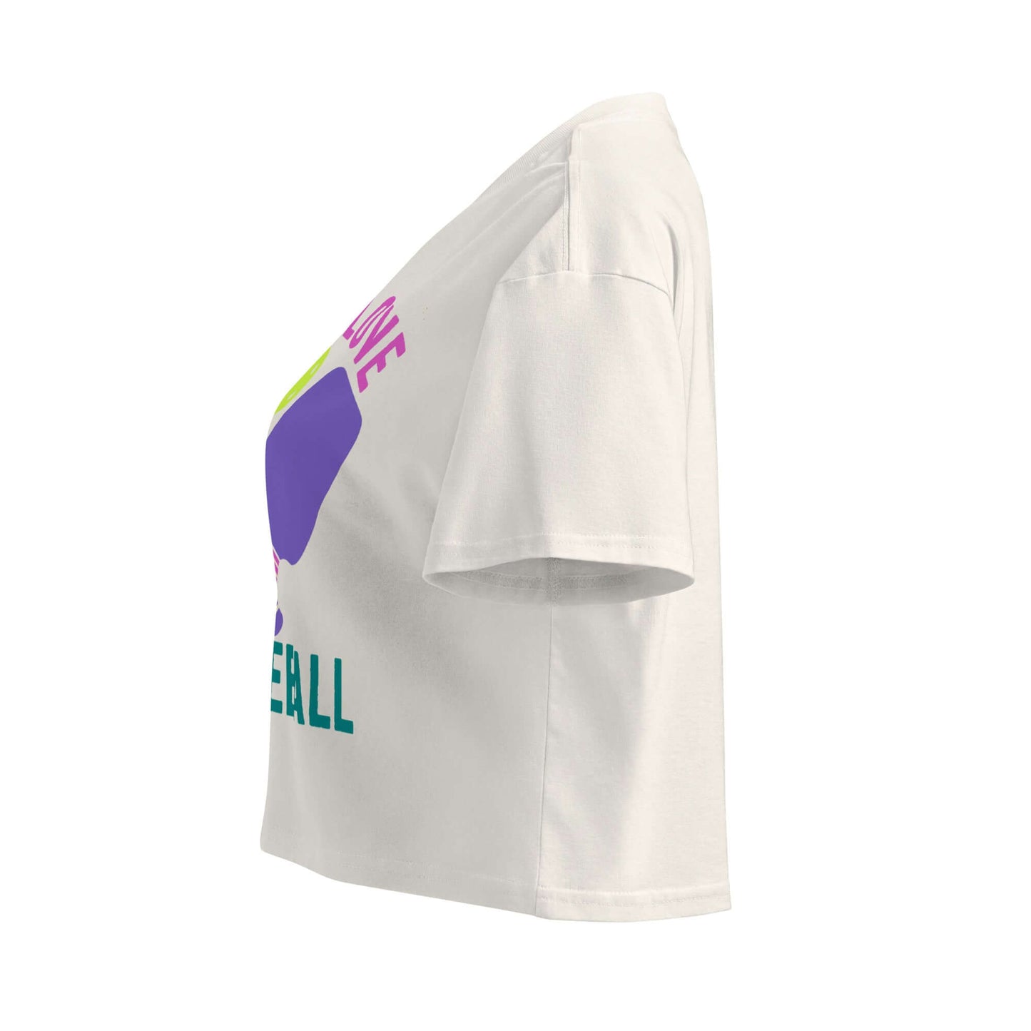 Women's Peace, Love, Pickleball Crop Top showcasing a vibrant design in a stylish side view.