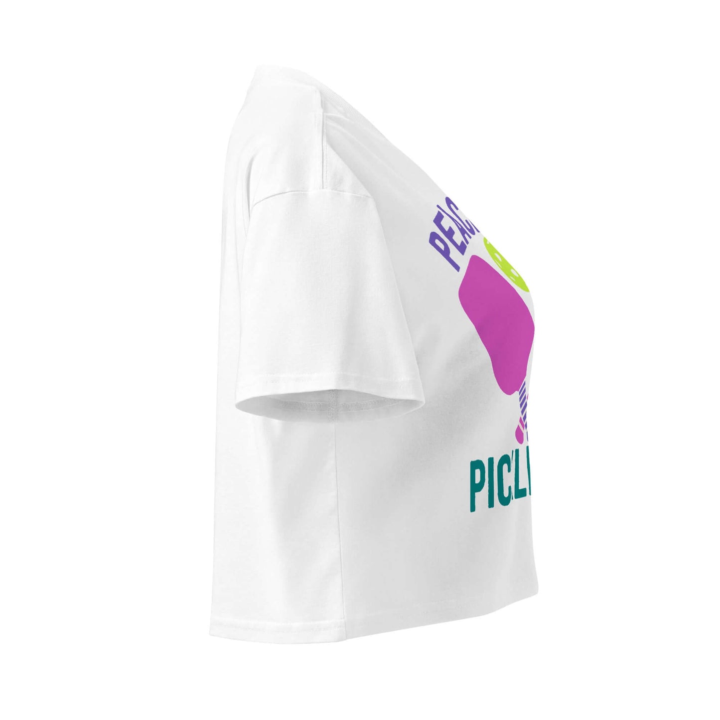 Side view of Women's Peace, Love, Pickleball crop top showcasing its vibrant design and comfortable fit.