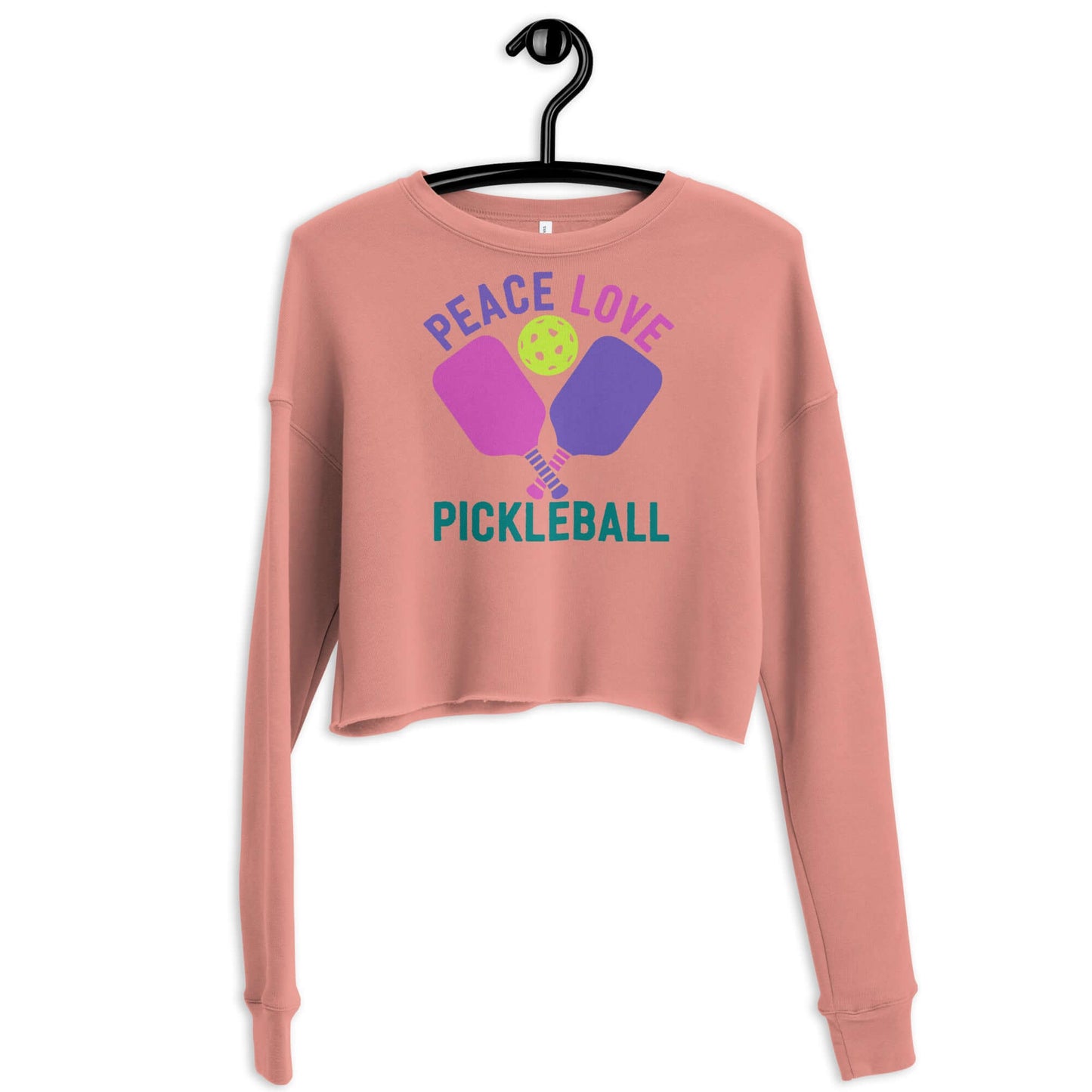Women's crop sweatshirt featuring 'Peace Love Pickleball' graphic, perfect for stylish pickleball enthusiasts.