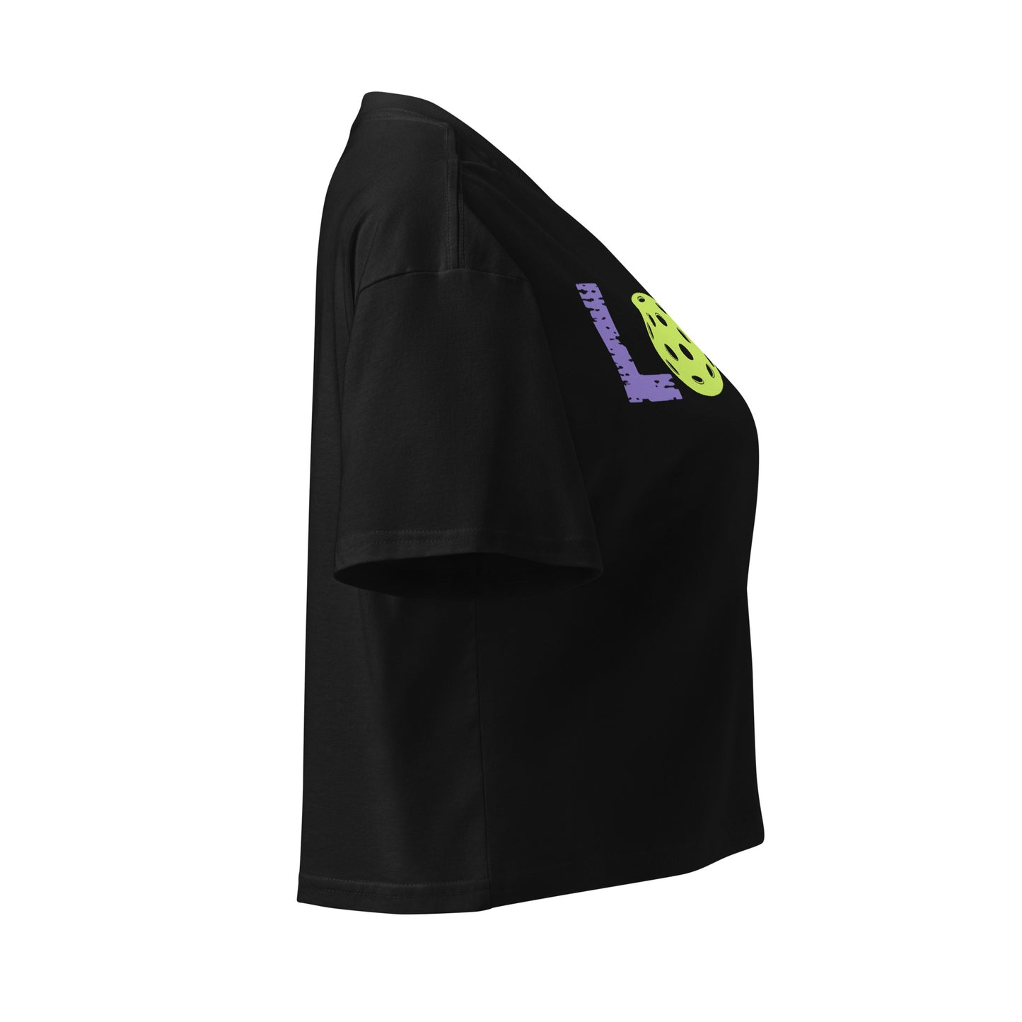 Side view of Women’s LOVE Pickleball Crop Top in black, featuring playful graphic design and relaxed fit.