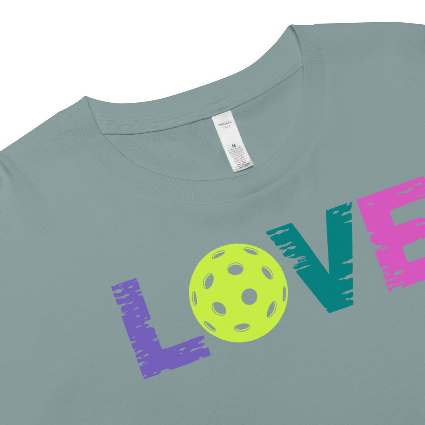 Women’s LOVE Pickleball Crop Top in teal with vibrant design, perfect for athletic wear and casual outings.
