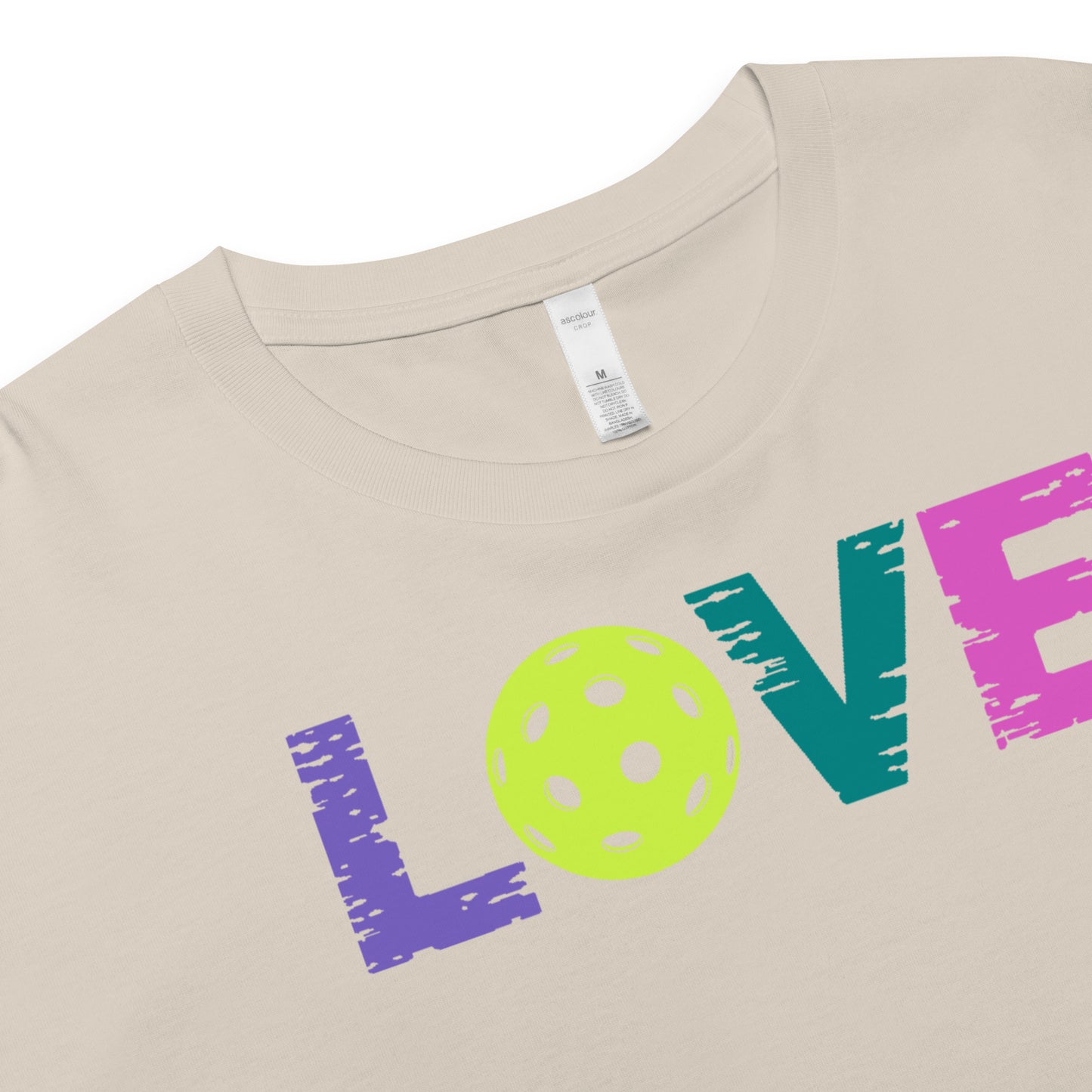 Women’s LOVE Pickleball Crop Top featuring colorful graphics and soft fabric design.
