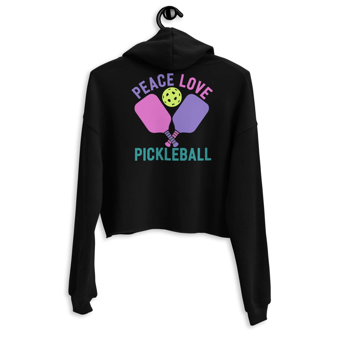 Black women's crop hoodie with 'Peace Love Pickleball' graphic and pickleball paddles design on the back.