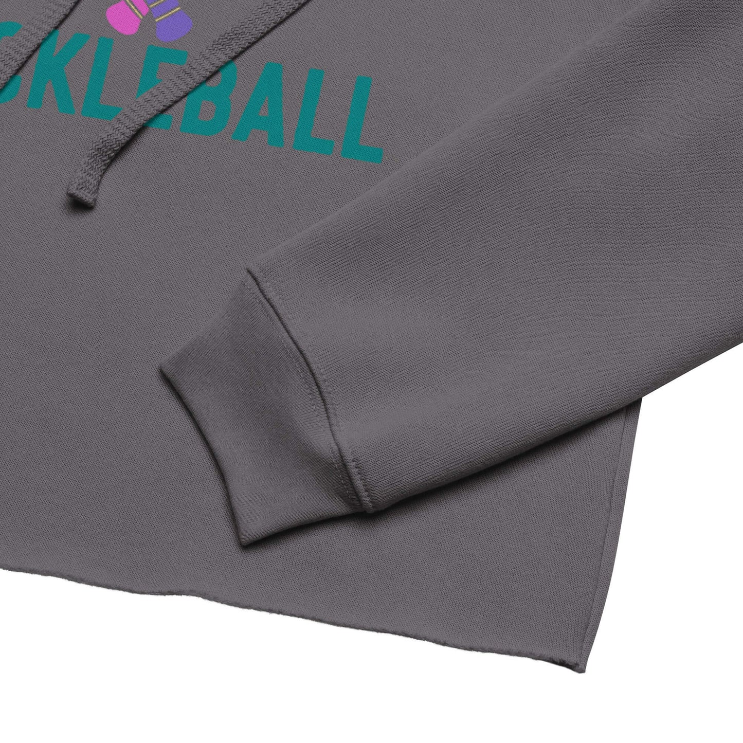 Close-up of Women's Peace, Love, Pickleball Crop Hoodie showing sleeve and cropped hem detail.