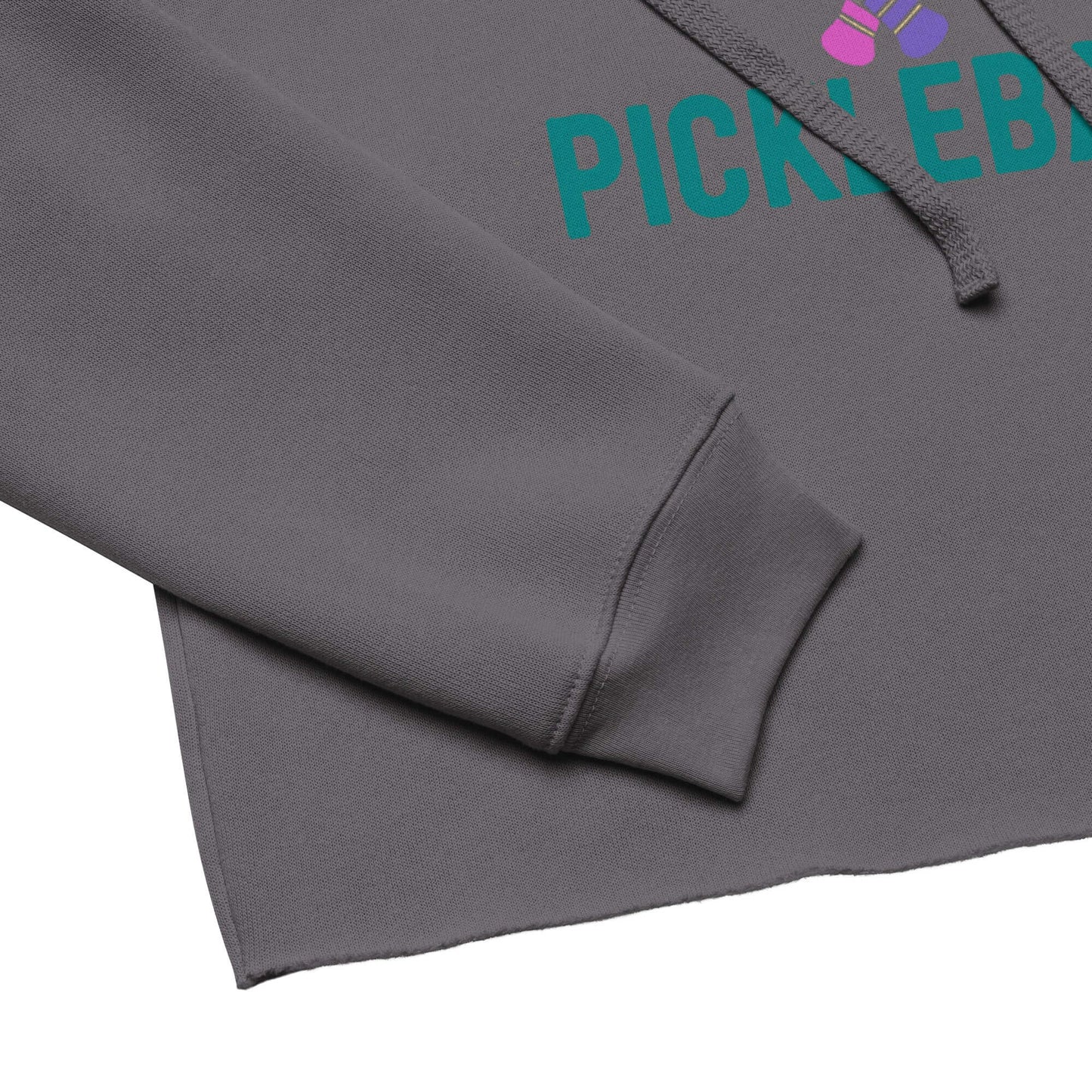 Close-up of Women's Peace, Love, Pickleball Crop Hoodie featuring cropped fit and playful graphic design.