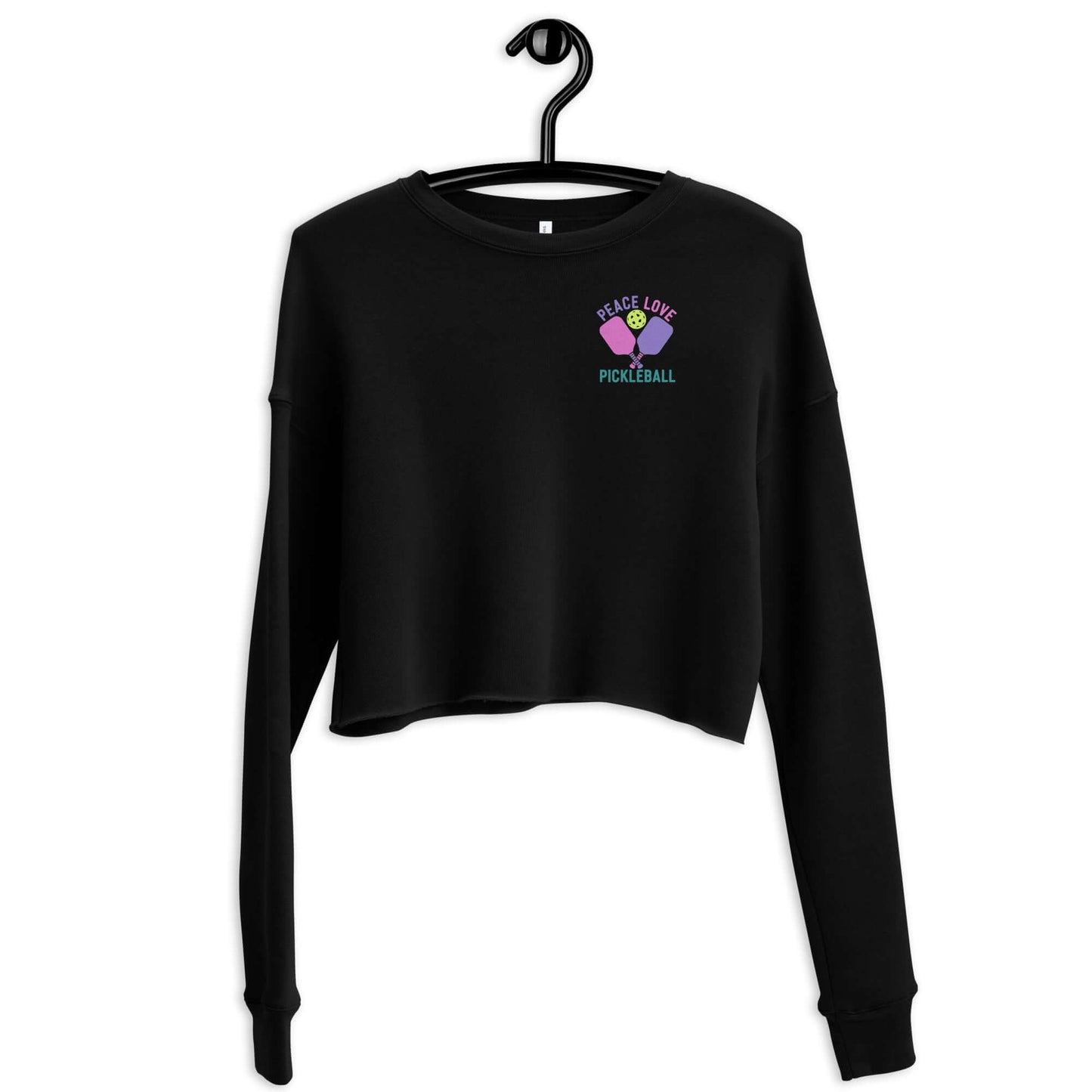 Black women's crop sweatshirt featuring 'Peace Love Pickleball' graphic.