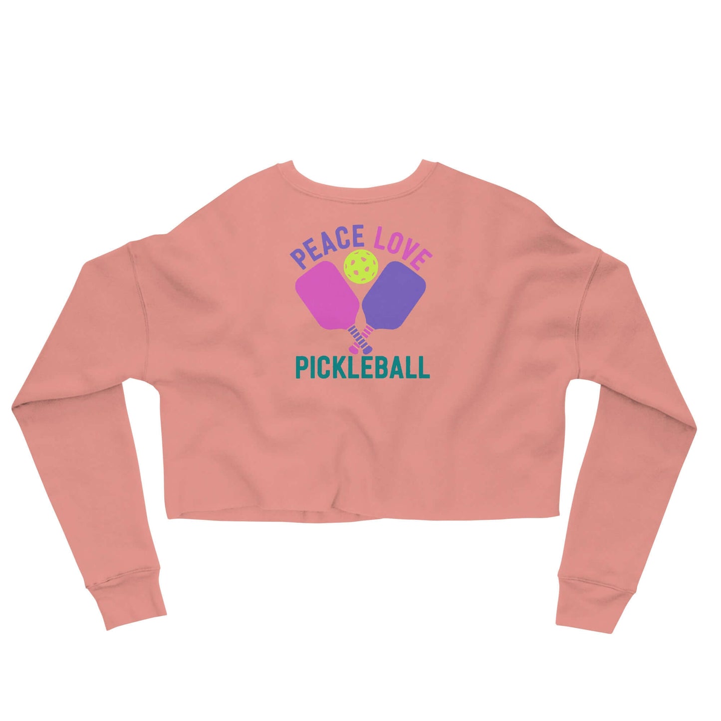 Women's Peace Love Pickleball crop sweatshirt in peach color featuring playful graphics.