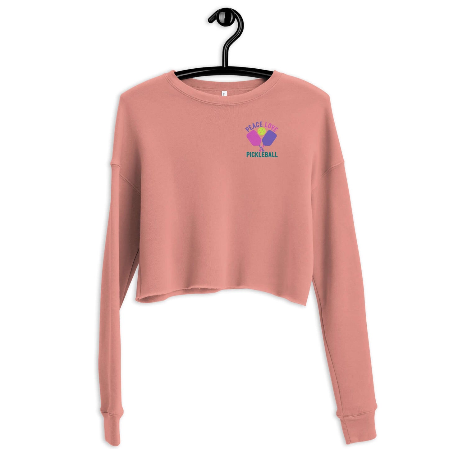 Women's pink crop sweatshirt with 'Peace, Love, Pickleball' graphic design, perfect for style and comfort on or off the court.