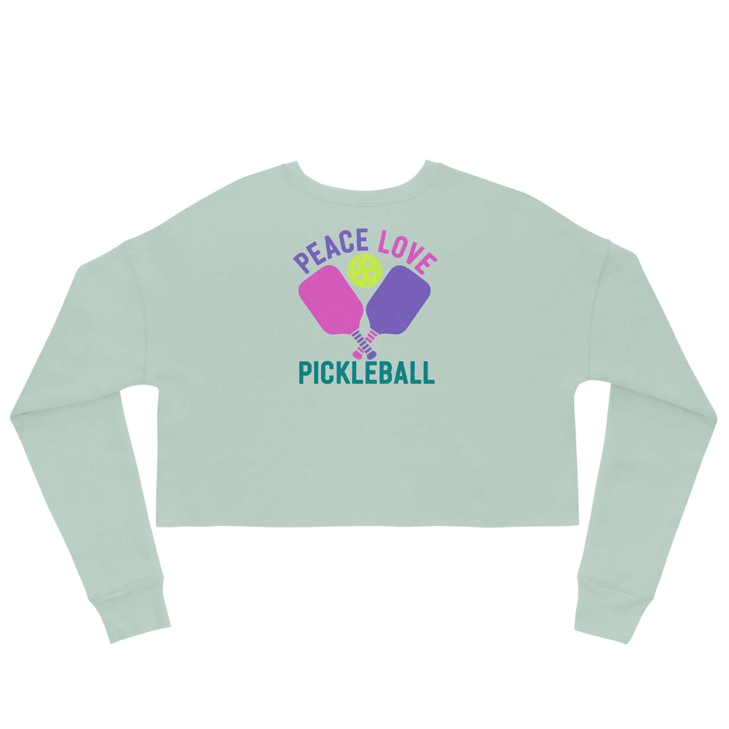 Women's crop sweatshirt featuring 'Peace Love Pickleball' in vibrant colors on a mint green background.
