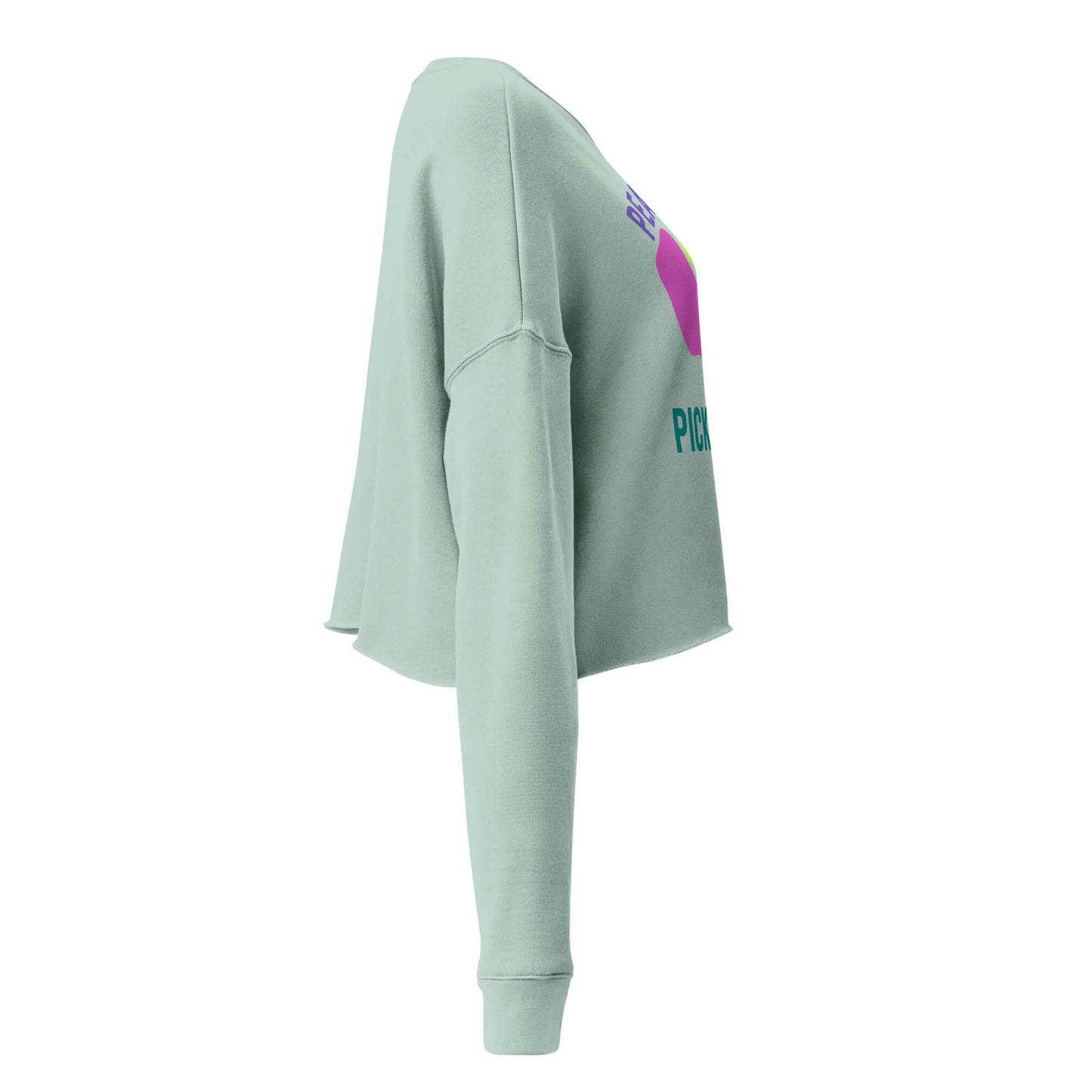 Side view of Women's Peace, Love, Pickleball Crop Sweatshirt in light green, showcasing trendy design and comfortable fit.