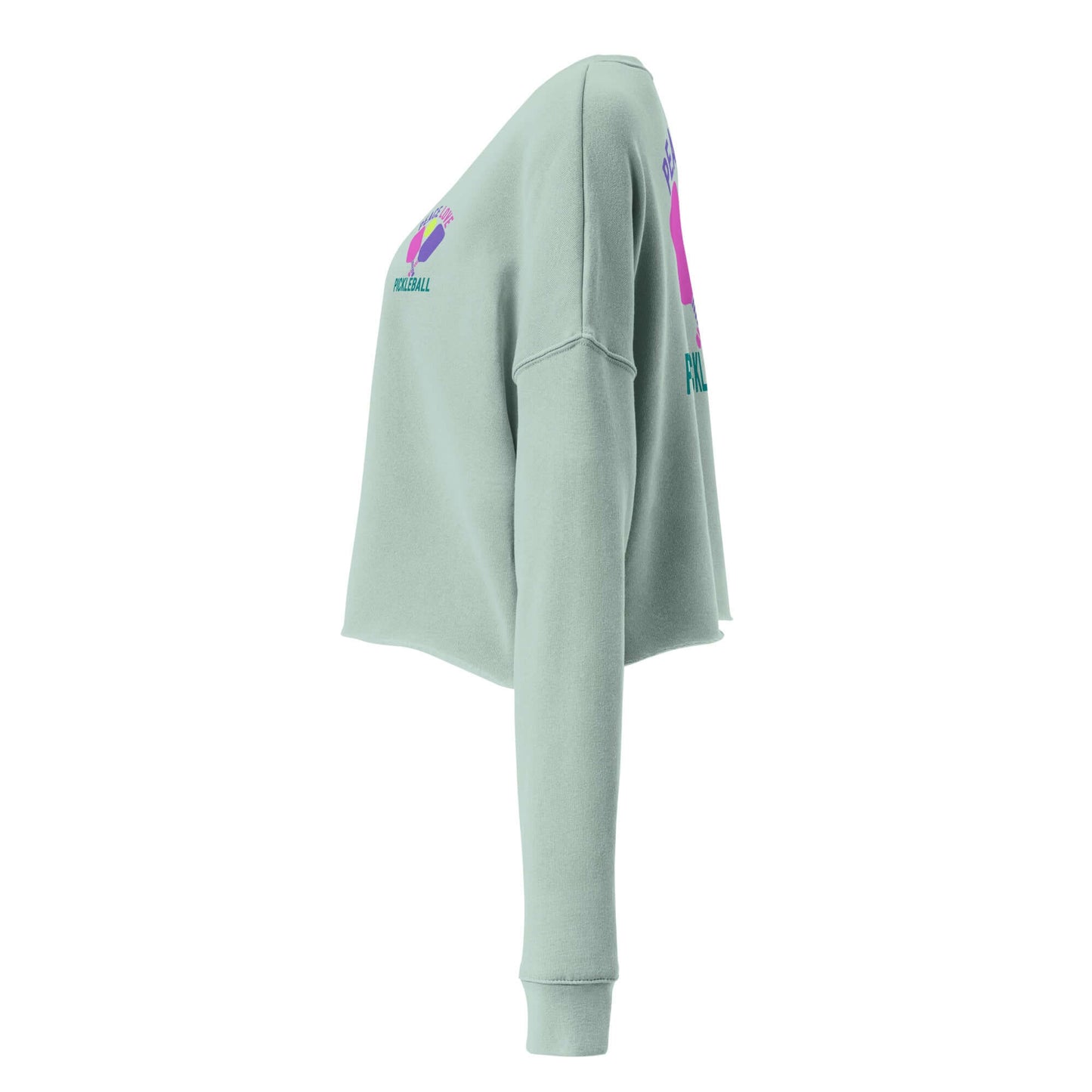 Side view of Women's Peace, Love, Pickleball Crop Sweatshirt in green, featuring colorful graphics and a stylish design.