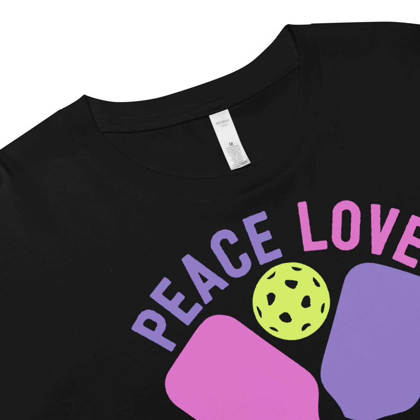 Close-up of Women's Peace, Love, Pickleball Crop Top design featuring vibrant colors and pickleball graphic.