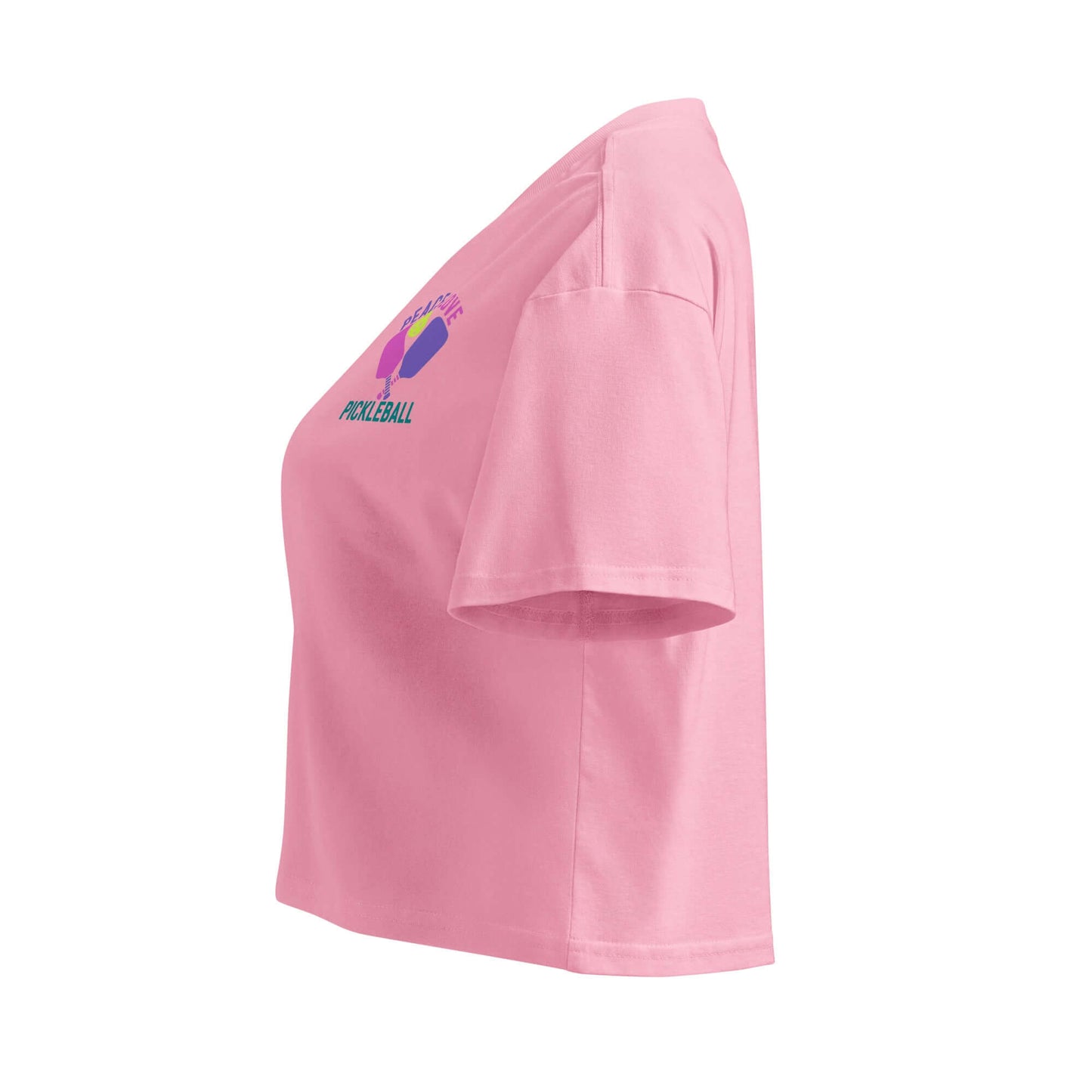 Side view of a pink Women's Peace, Love, Pickleball Crop Top with colorful graphics.