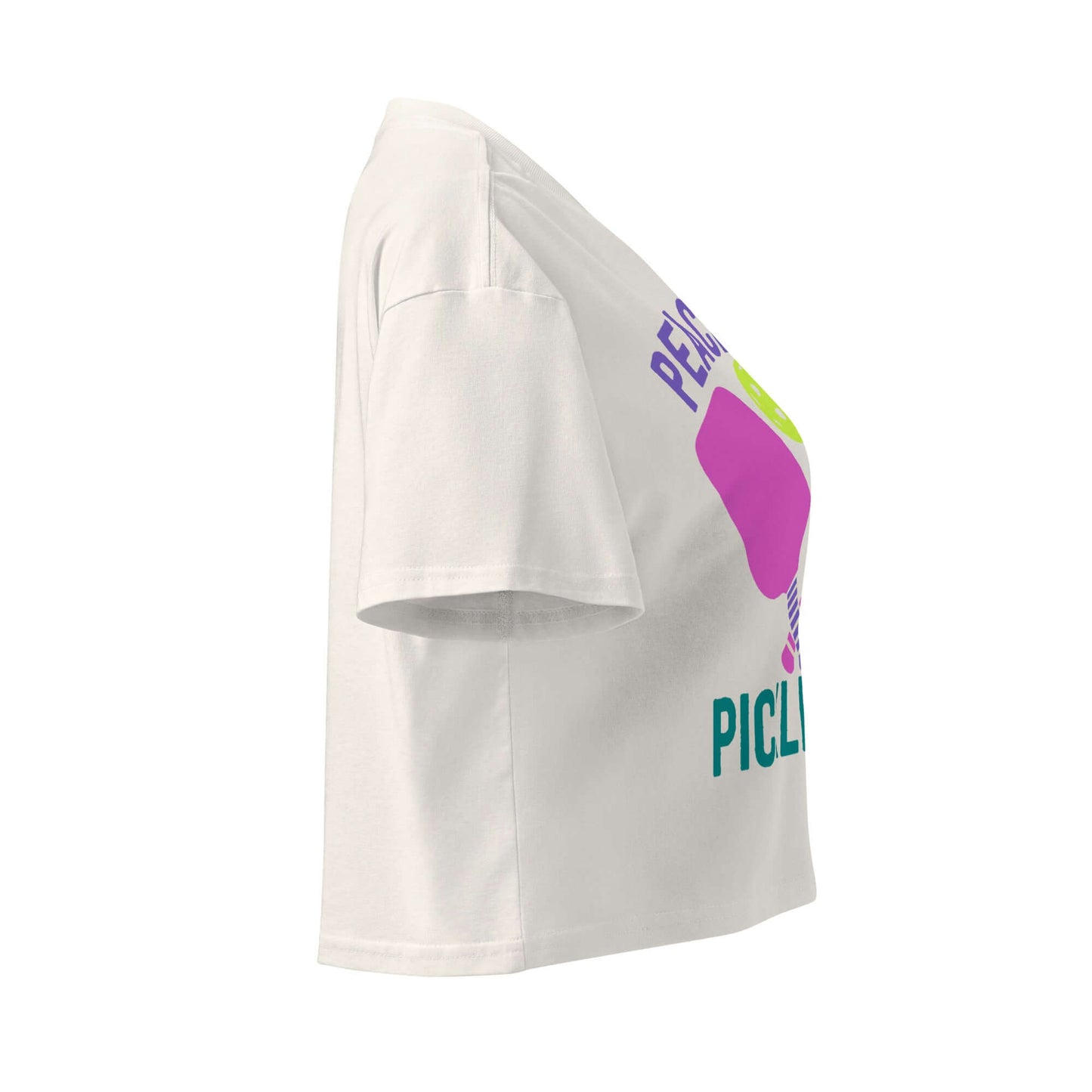Side view of Women's Peace, Love, Pickleball Crop Top in white with colorful graphic design.