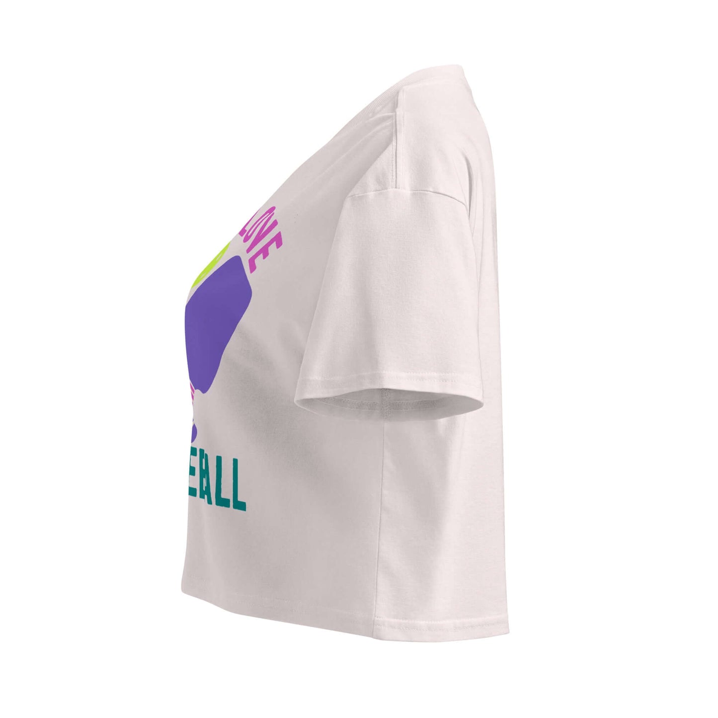 Side view of Women's Peace, Love, Pickleball Crop Top featuring colorful design for trendy style on and off the court.
