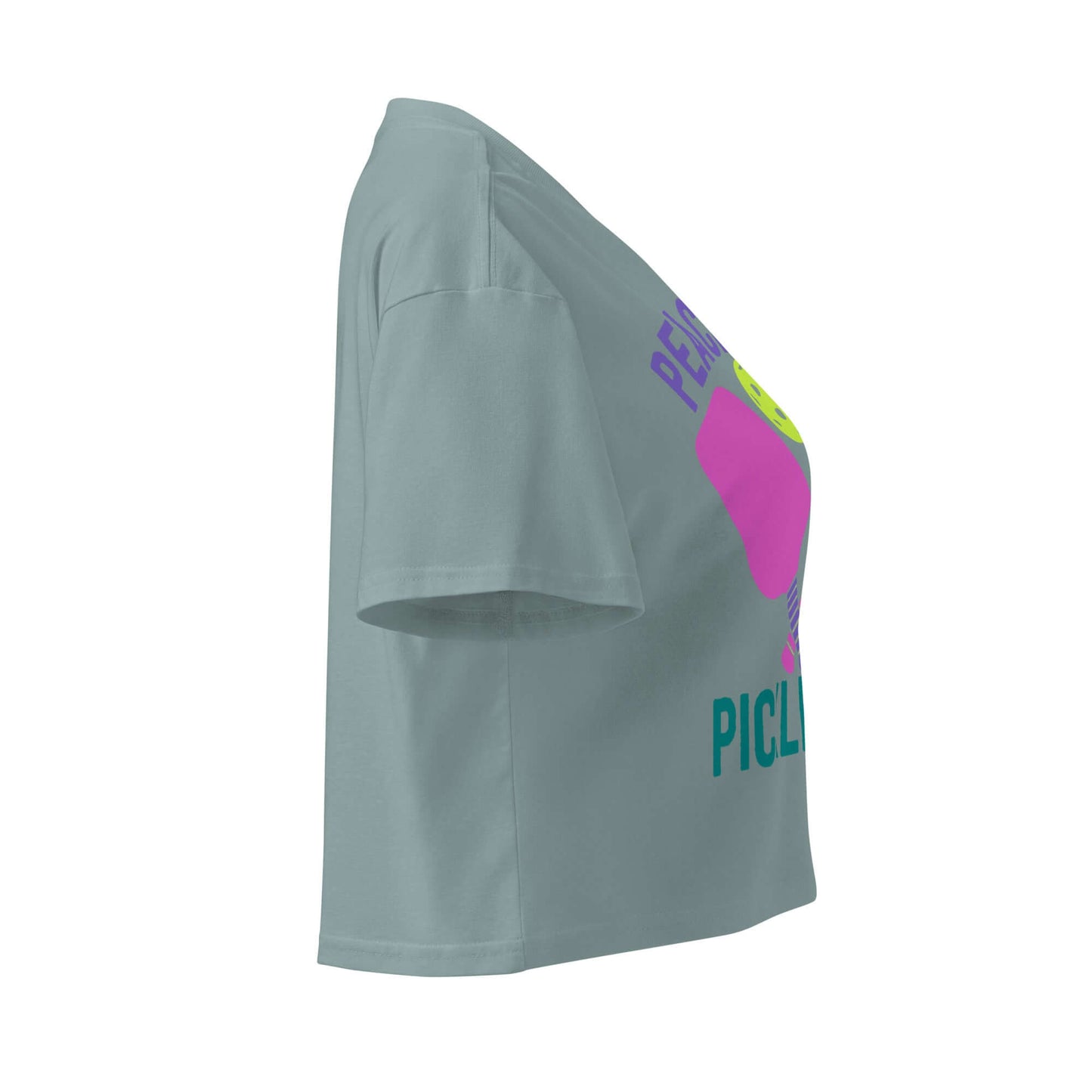 Side view of Women's Peace, Love, Pickleball Crop Top in light green, featuring vibrant pickleball design.