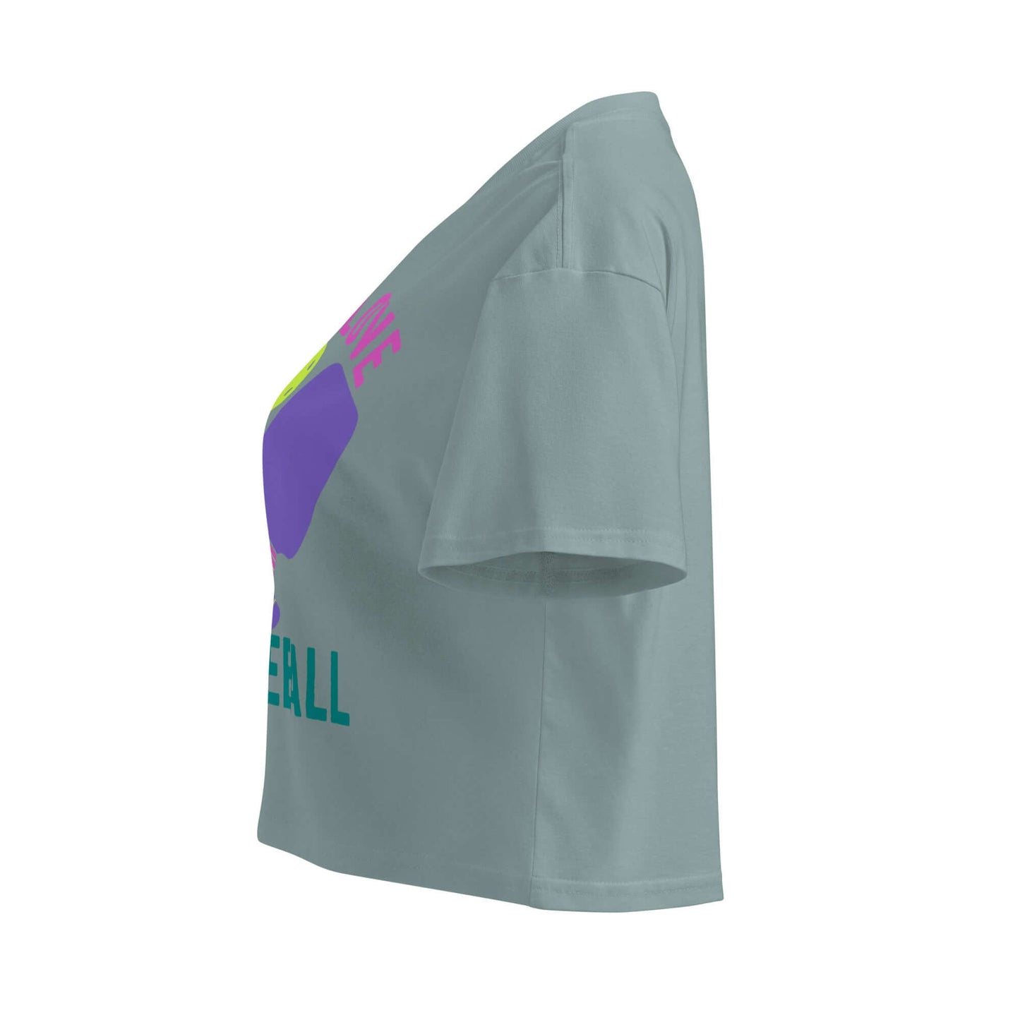 Side view of Women's Peace, Love, Pickleball crop top in green, featuring vibrant pickleball-themed design.